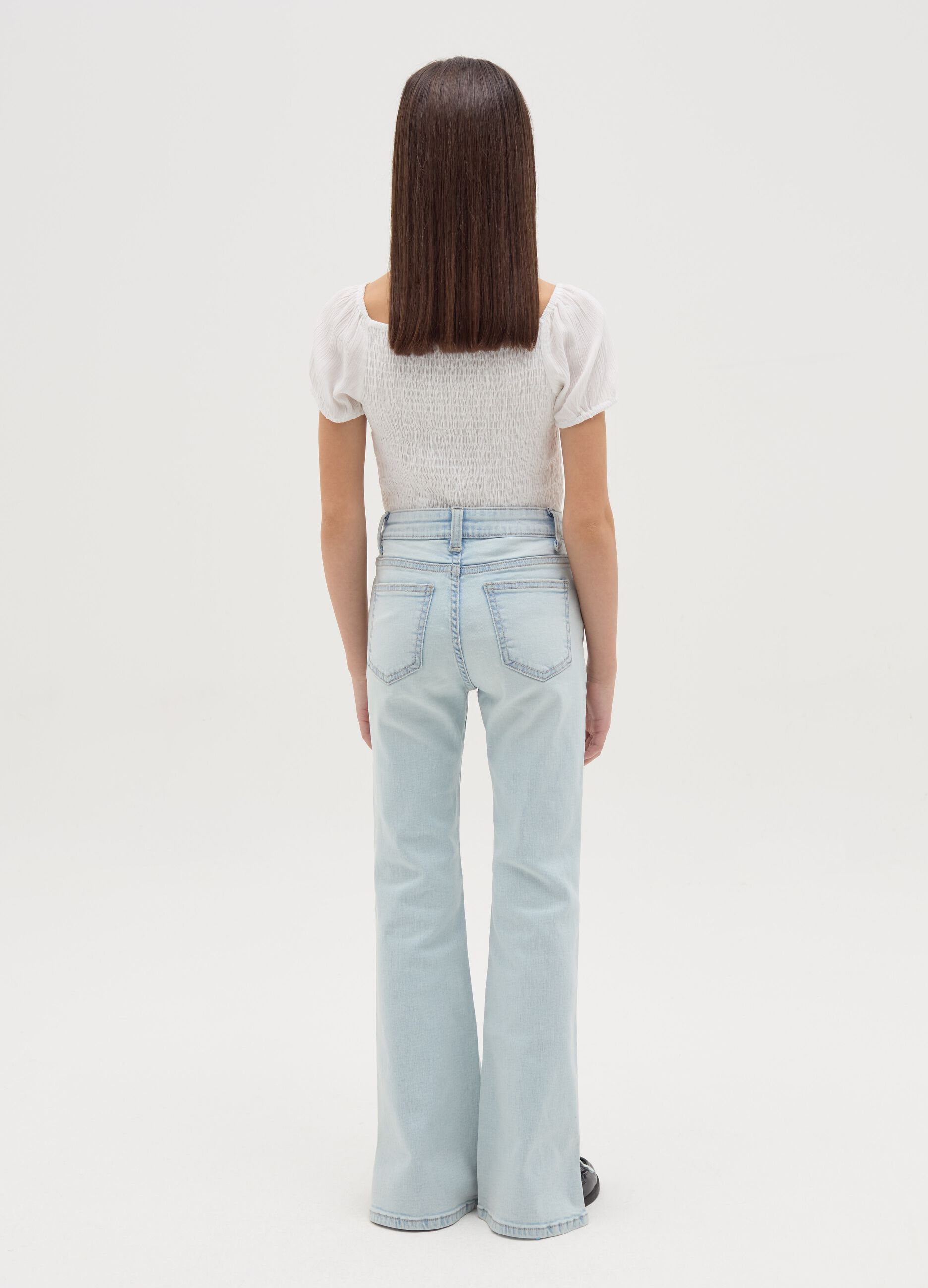 Jeans flare fit con scoloriture