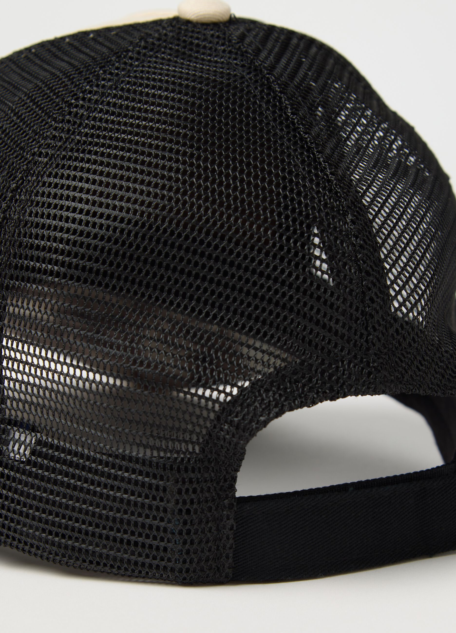 Beige and black cap with back mesh