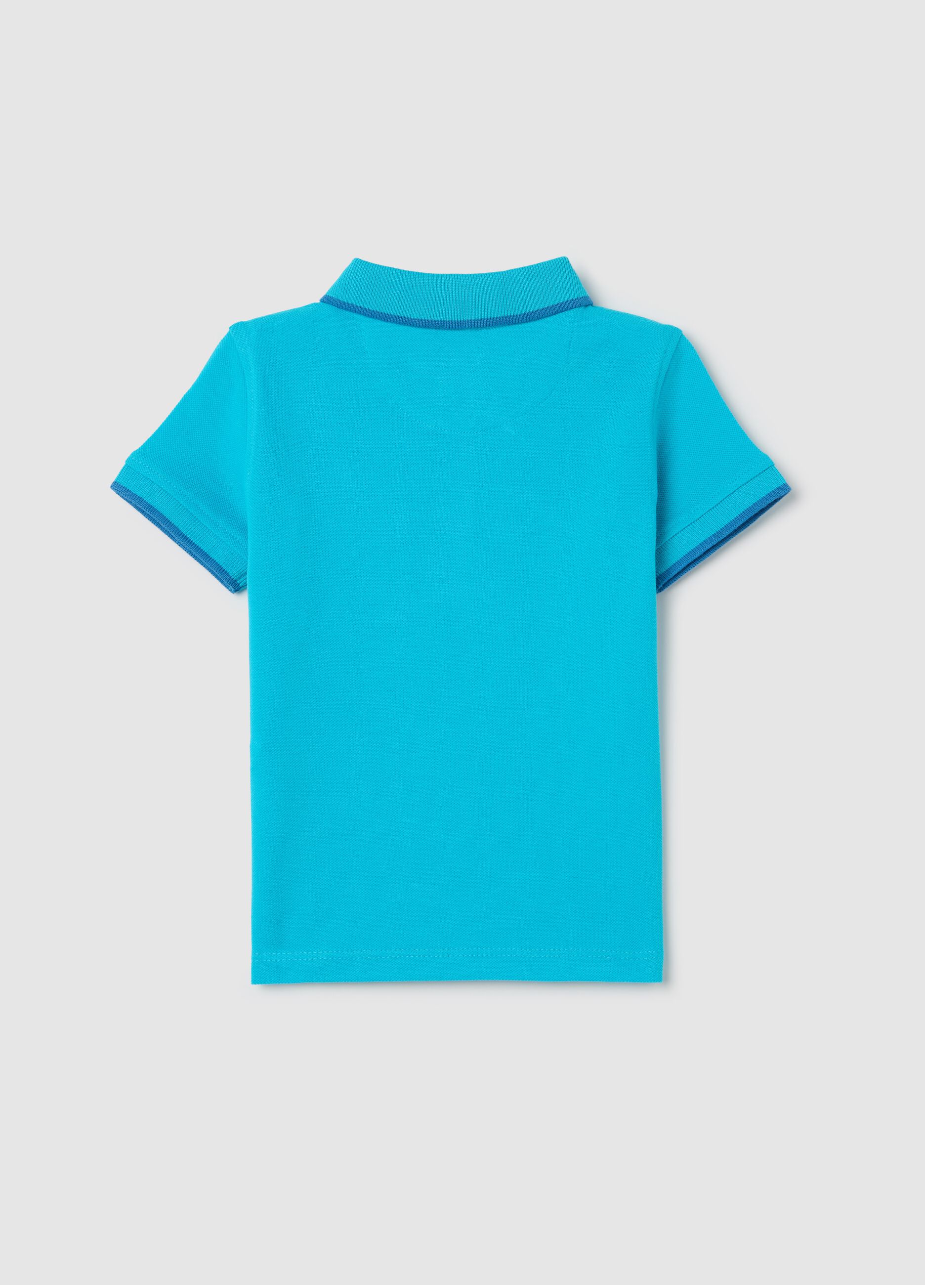 Light blue polo shirt in piquet with hippopotamus surfer