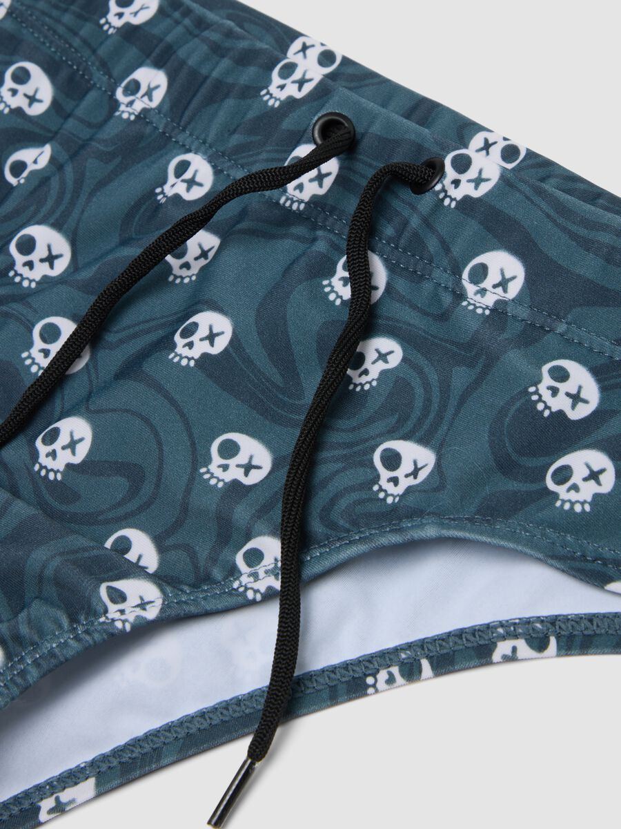 Blue stretch swim briefs with skull print_2
