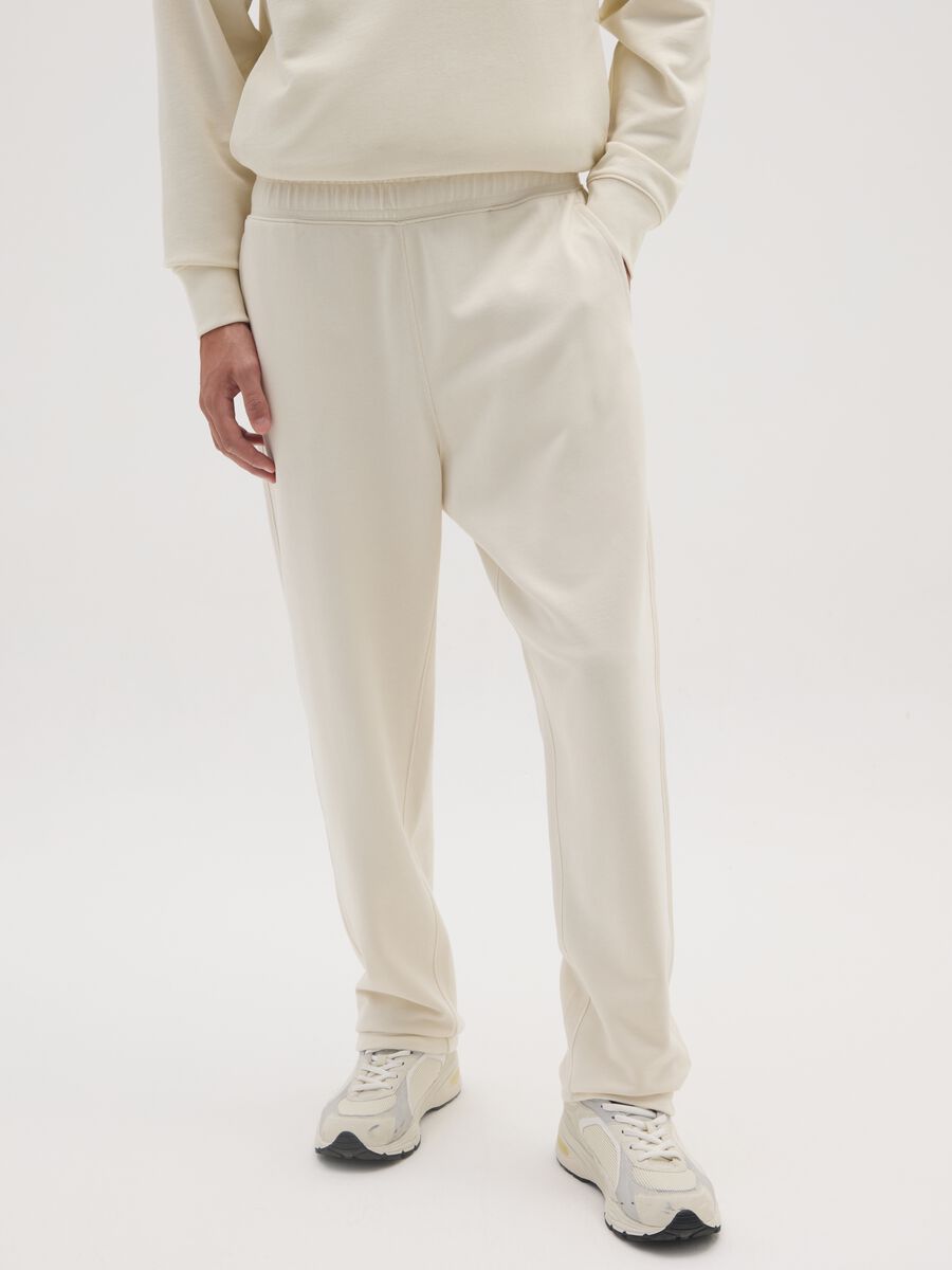 Beige pure cotton trousers with oversized fit_1