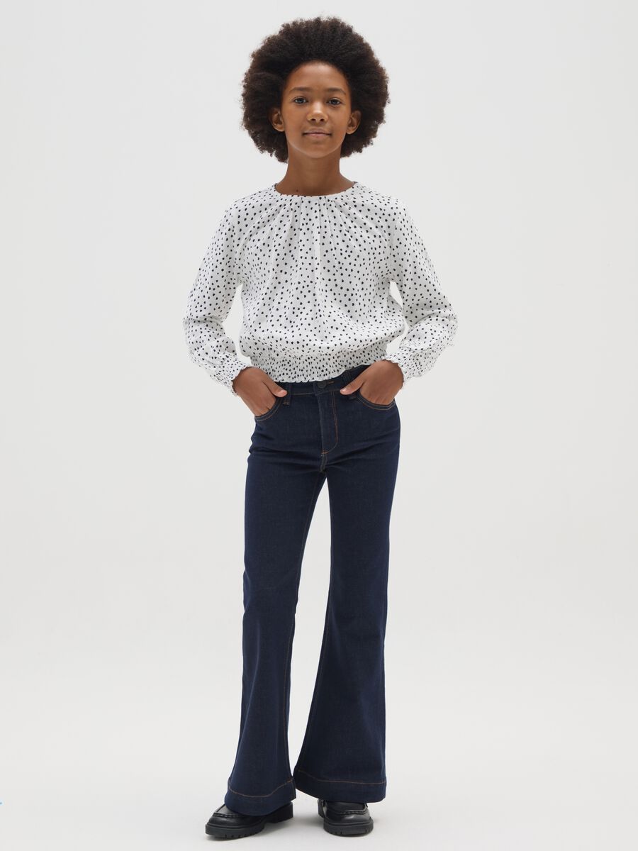 Jeans da ragazza in denim blu flare_1