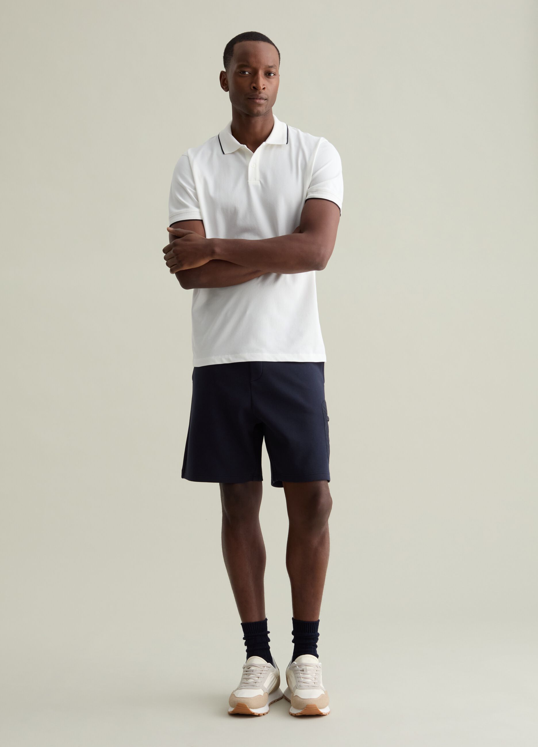 Polo shirt in technical fabric with contrasting edging