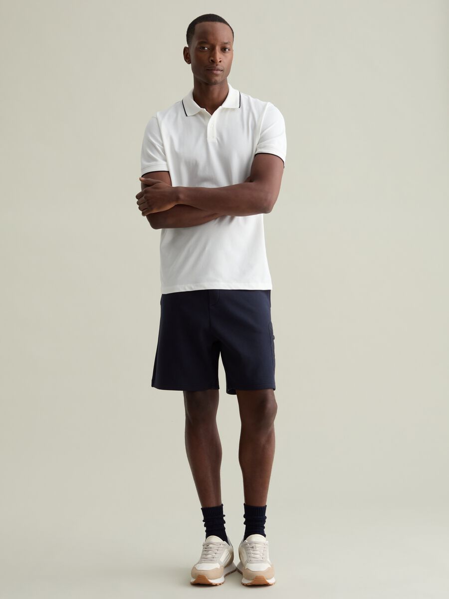 Polo shirt in technical fabric with contrasting edging_1