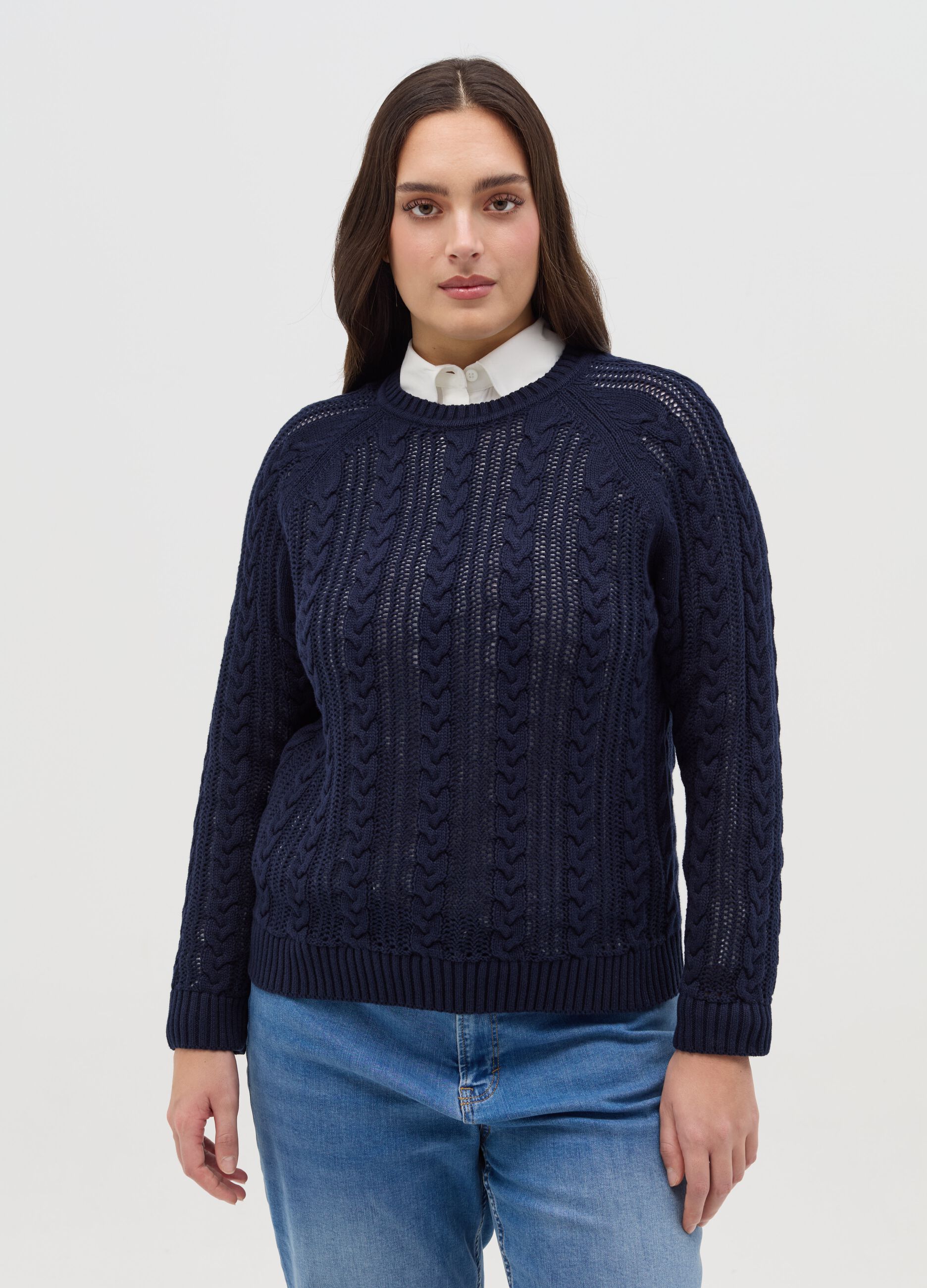 Curvy crochet pullover with cable-knit design