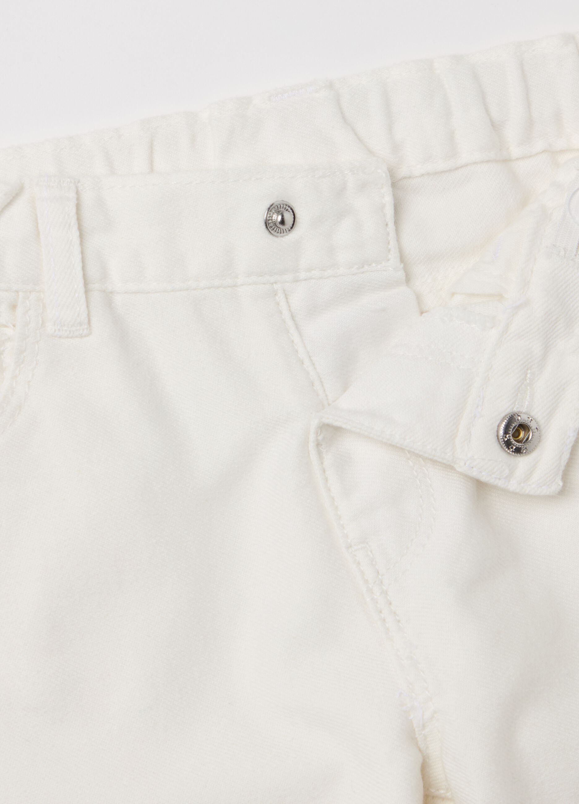Five-pocket trousers with broderie anglaise embroidery