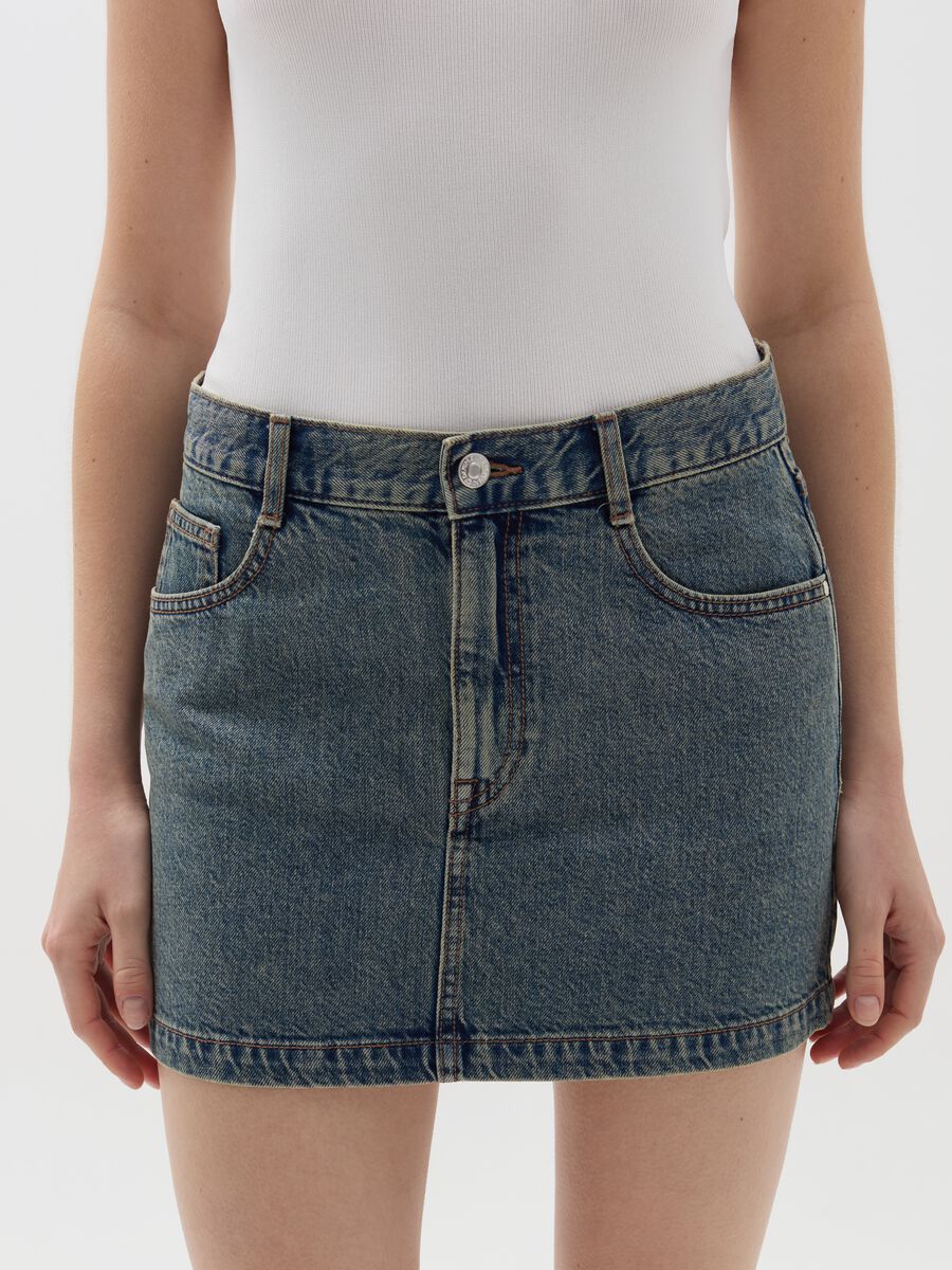 Denim miniskirt with five pockets_1