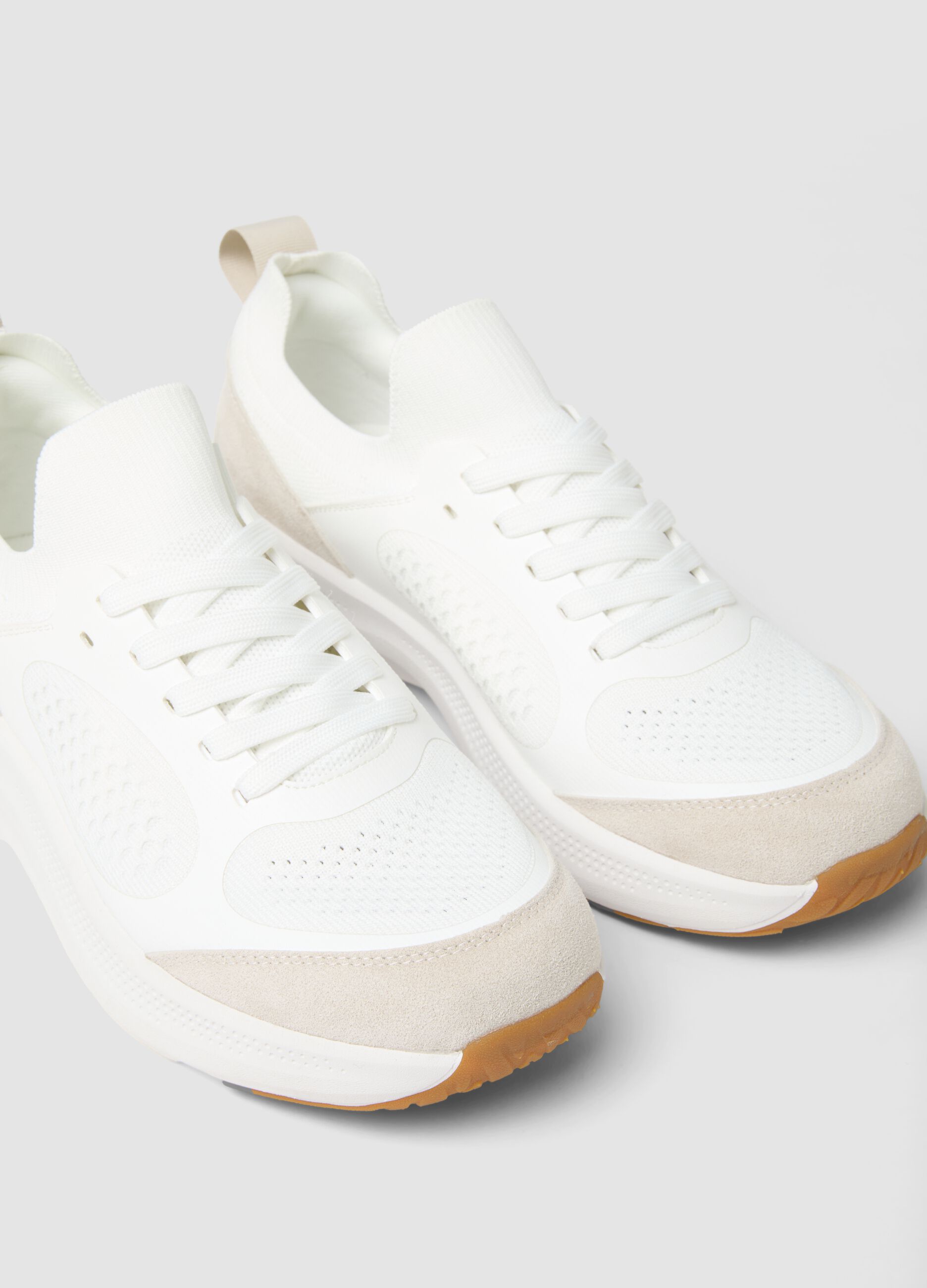 White and beige sporty trainers