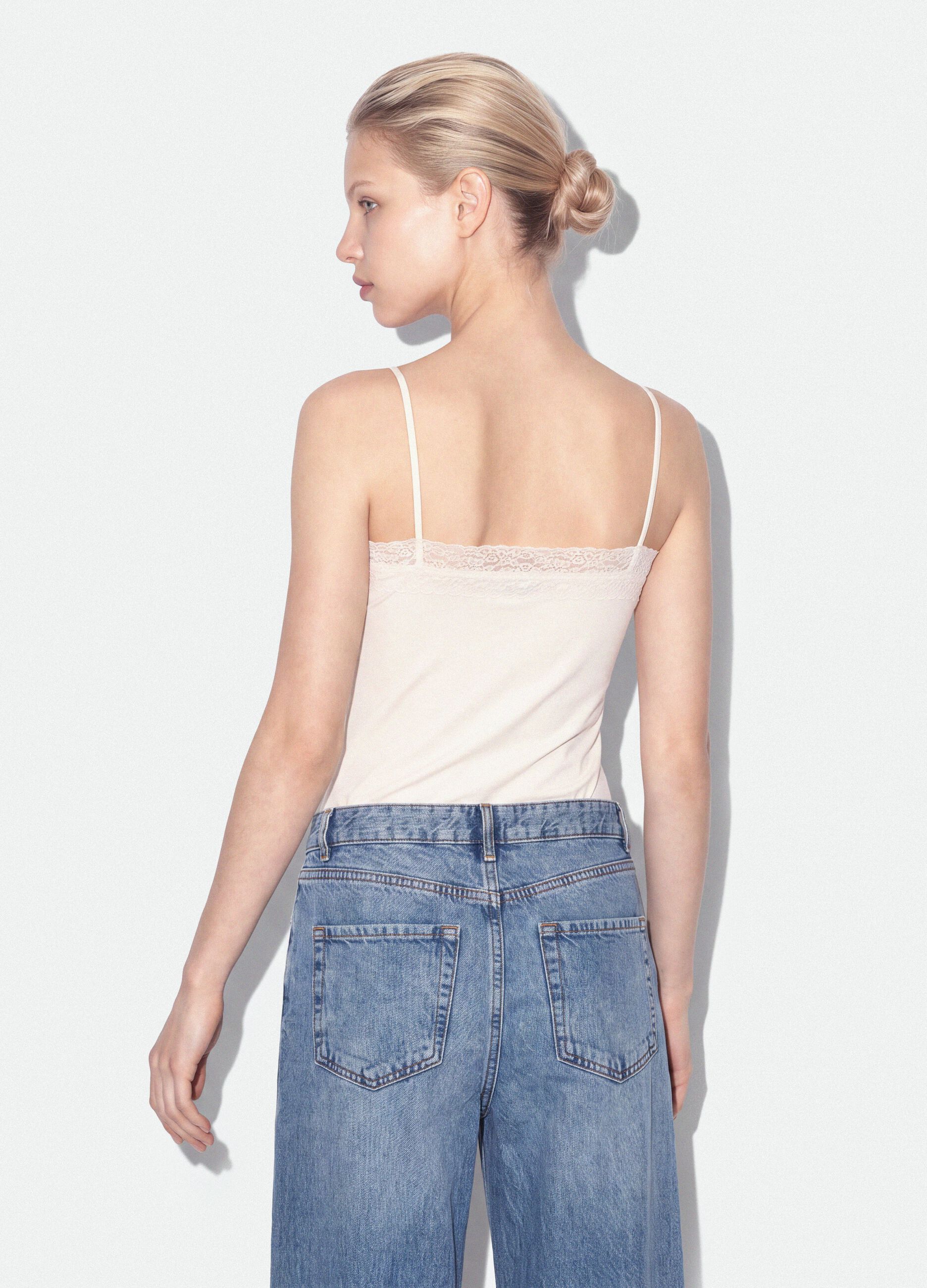 White fitted stretch-cotton bodysuit with lace