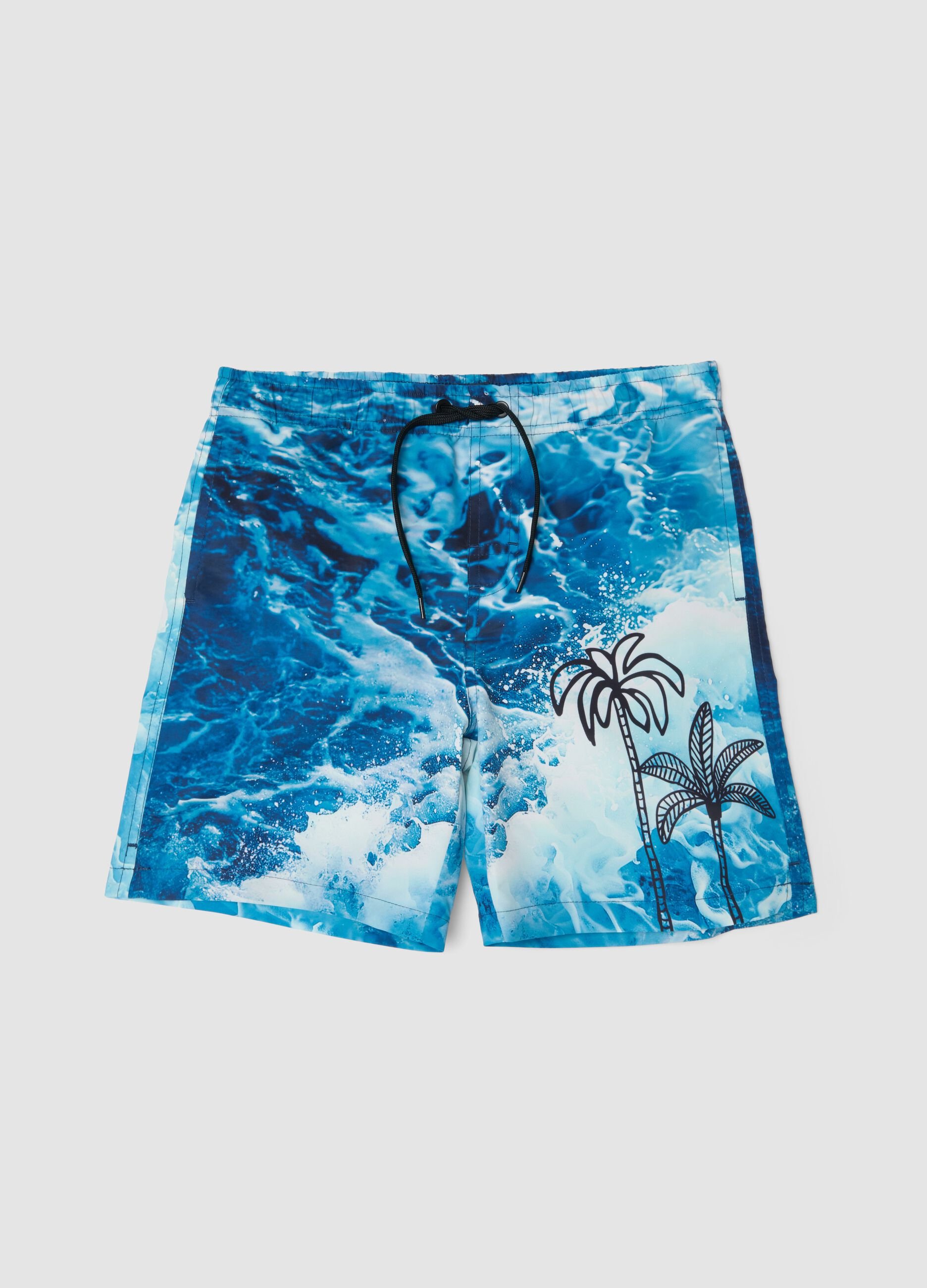 Blue boys&rsquo; swim shorts with wave and palm print