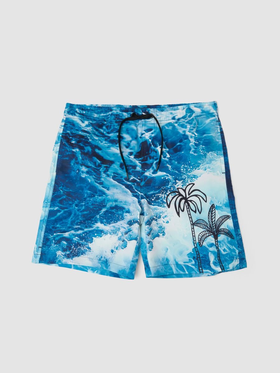 Blue boys&rsquo; swim shorts with wave and palm print_0
