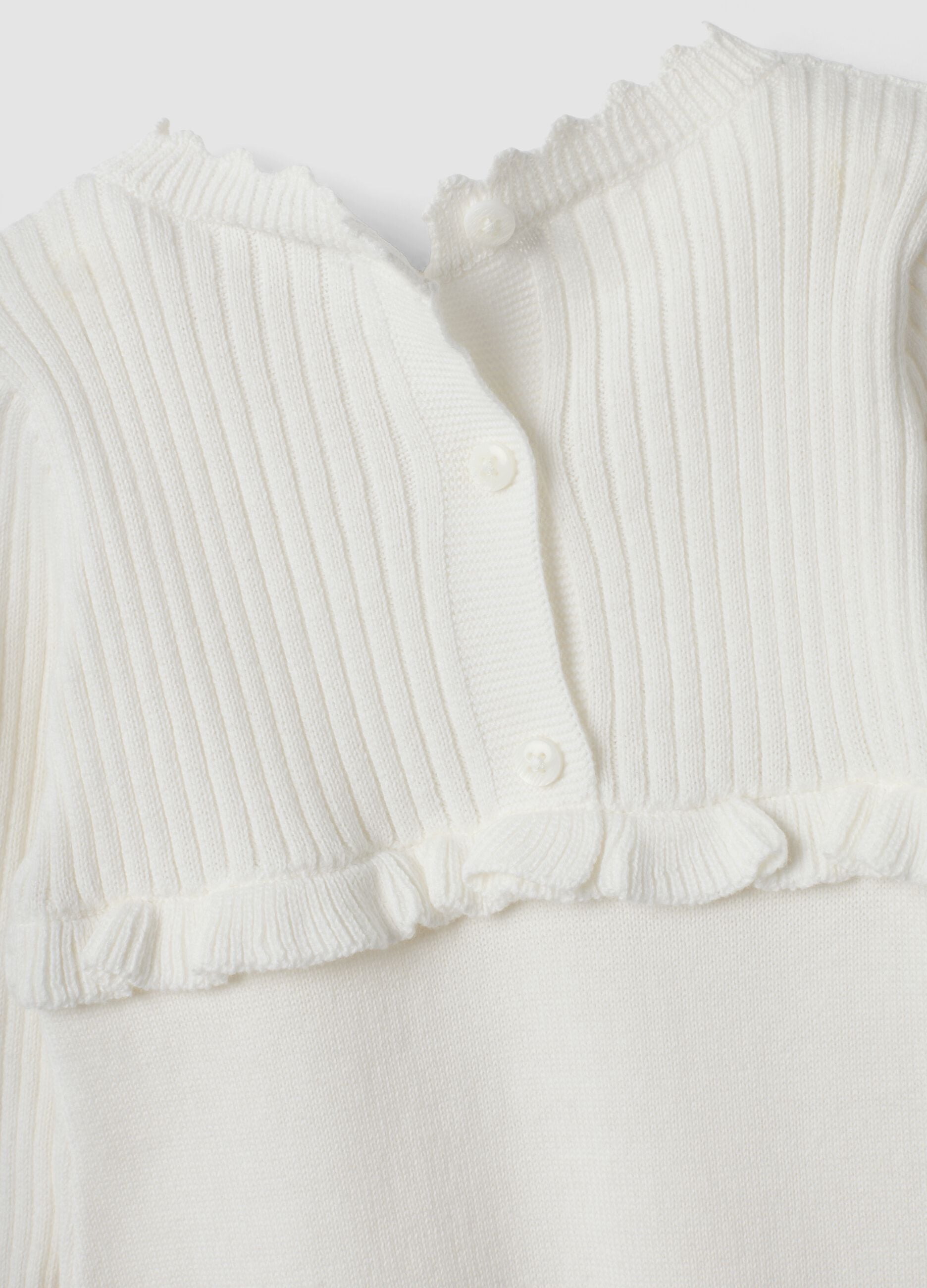White organic cotton baby sleepsuit with feet