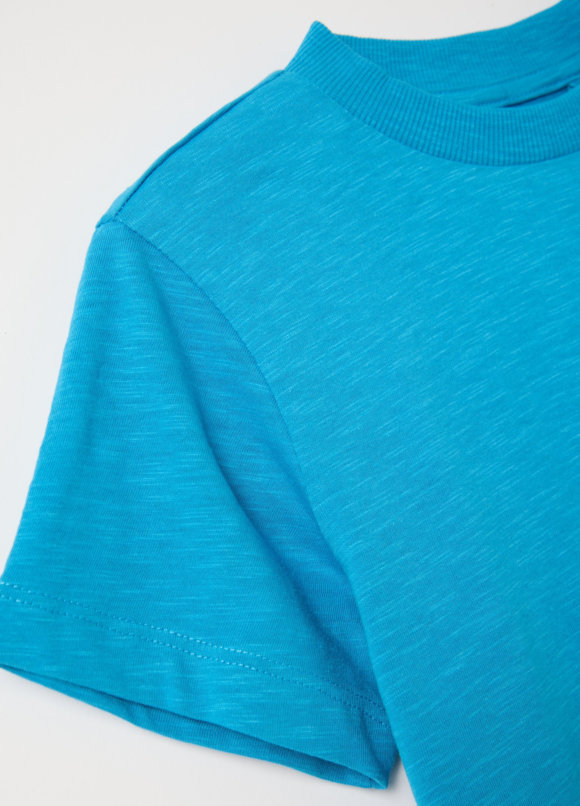 Light blue T-shirt in organic cotton with pocket