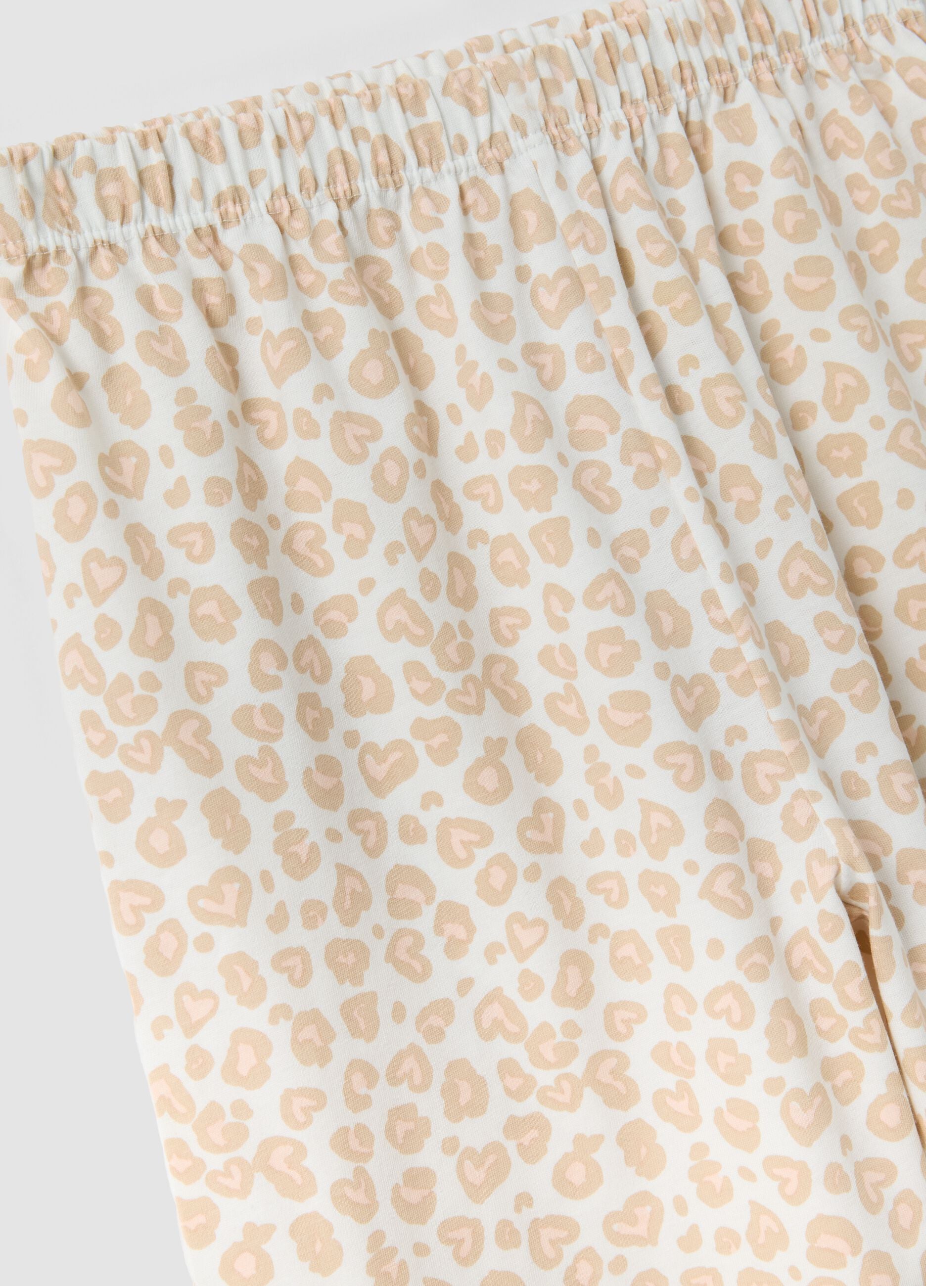 Pink organic cotton pyjamas with print and patterned trousers