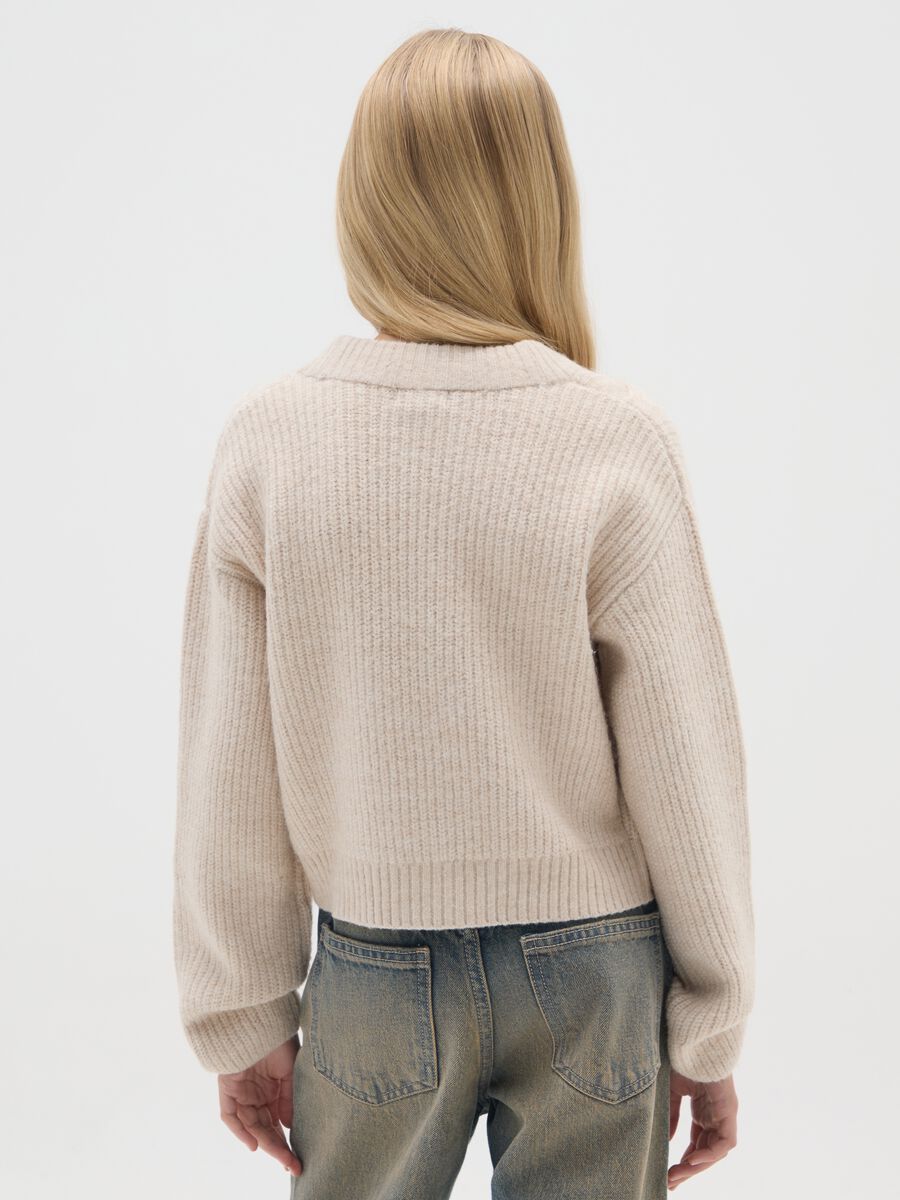 Beige V-neck cardigan with oversized fit for girls_1