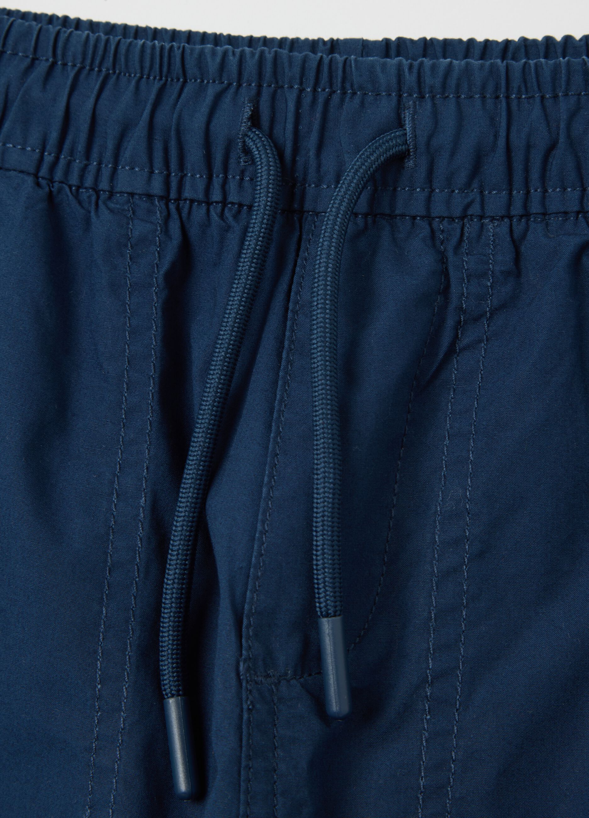 Blue trousers in cotton with drawstring