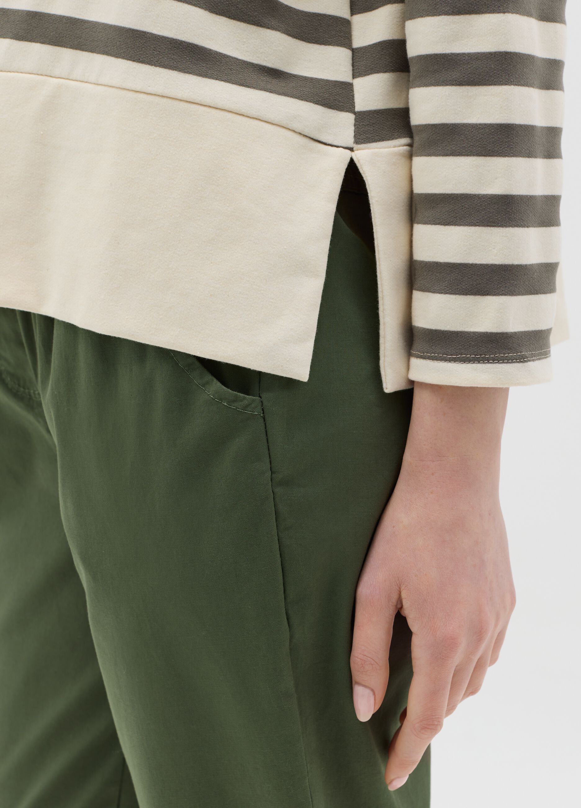 Beige and green striped top with long sleeves