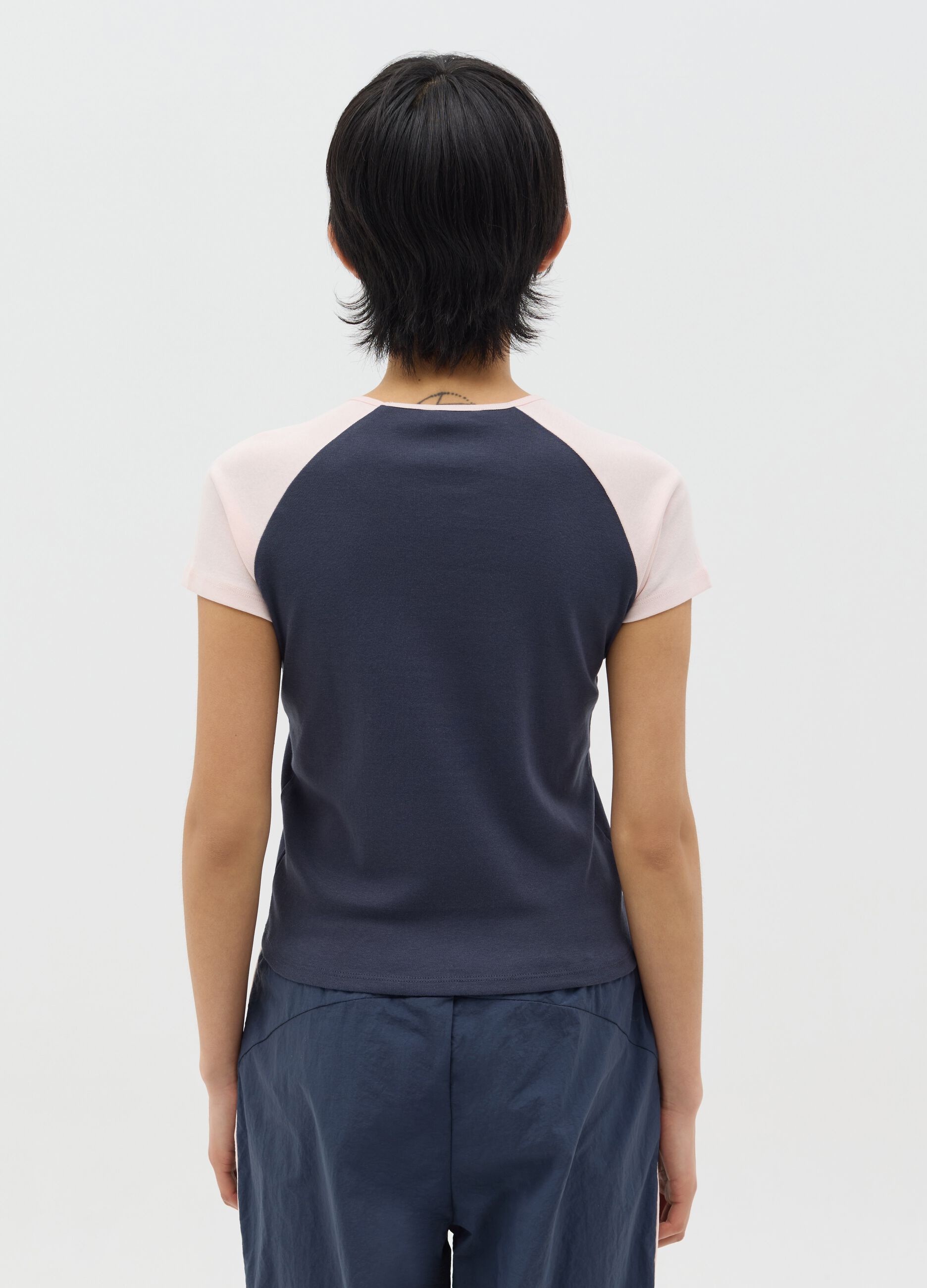 Blue T-shirt with pink raglan sleeves