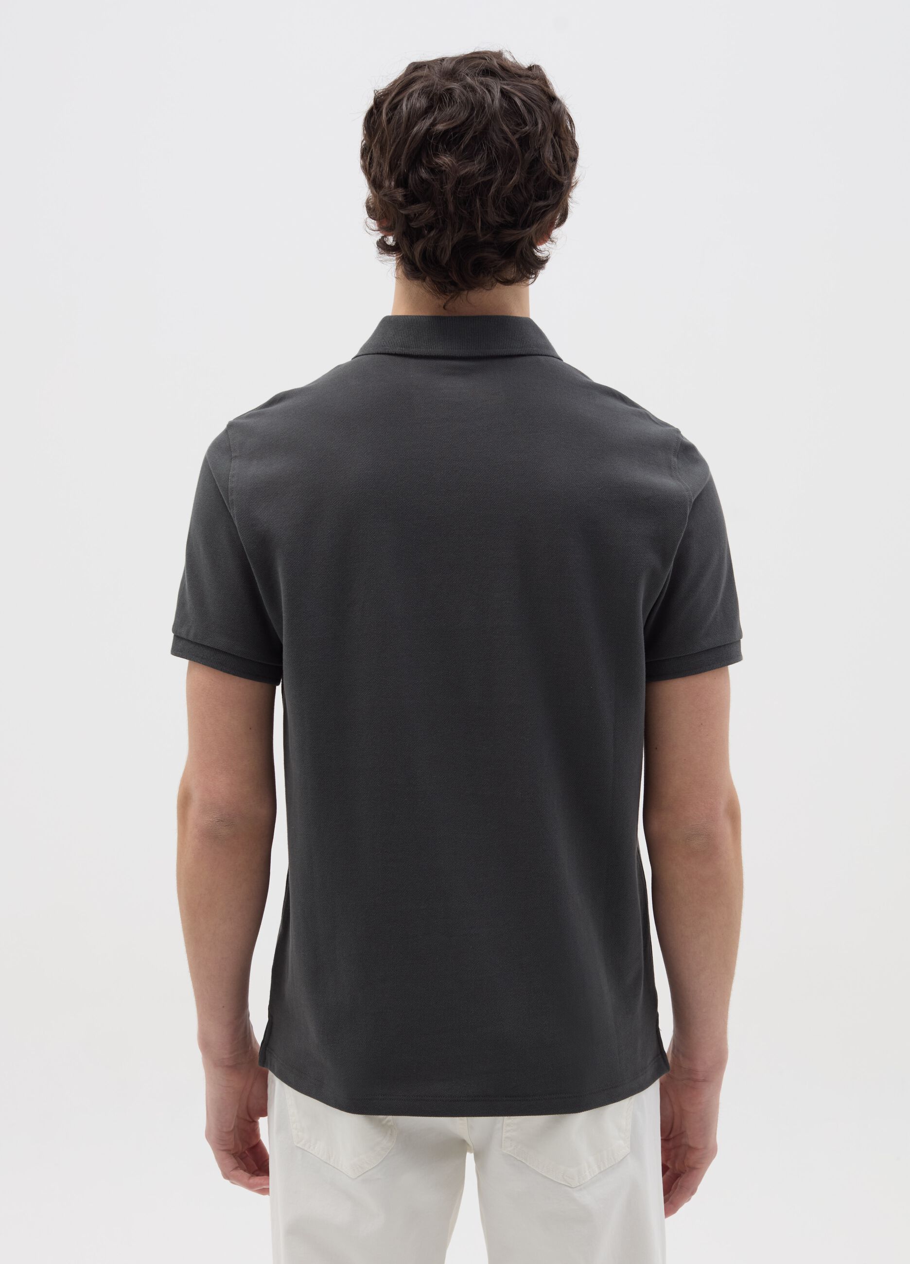 Solid colour polo shirt in organic cotton