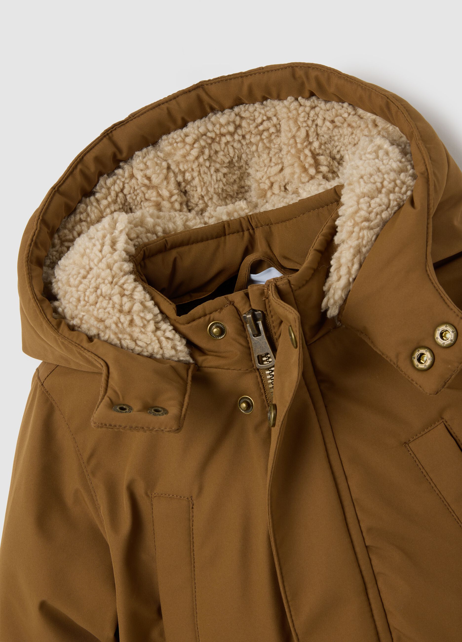 Brown parka with faux fur lining