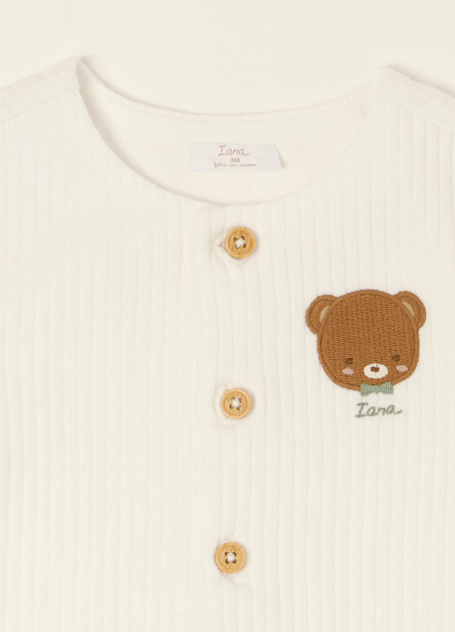 White ribbed pure cotton baby sleepsuit with teddy bear embroidery