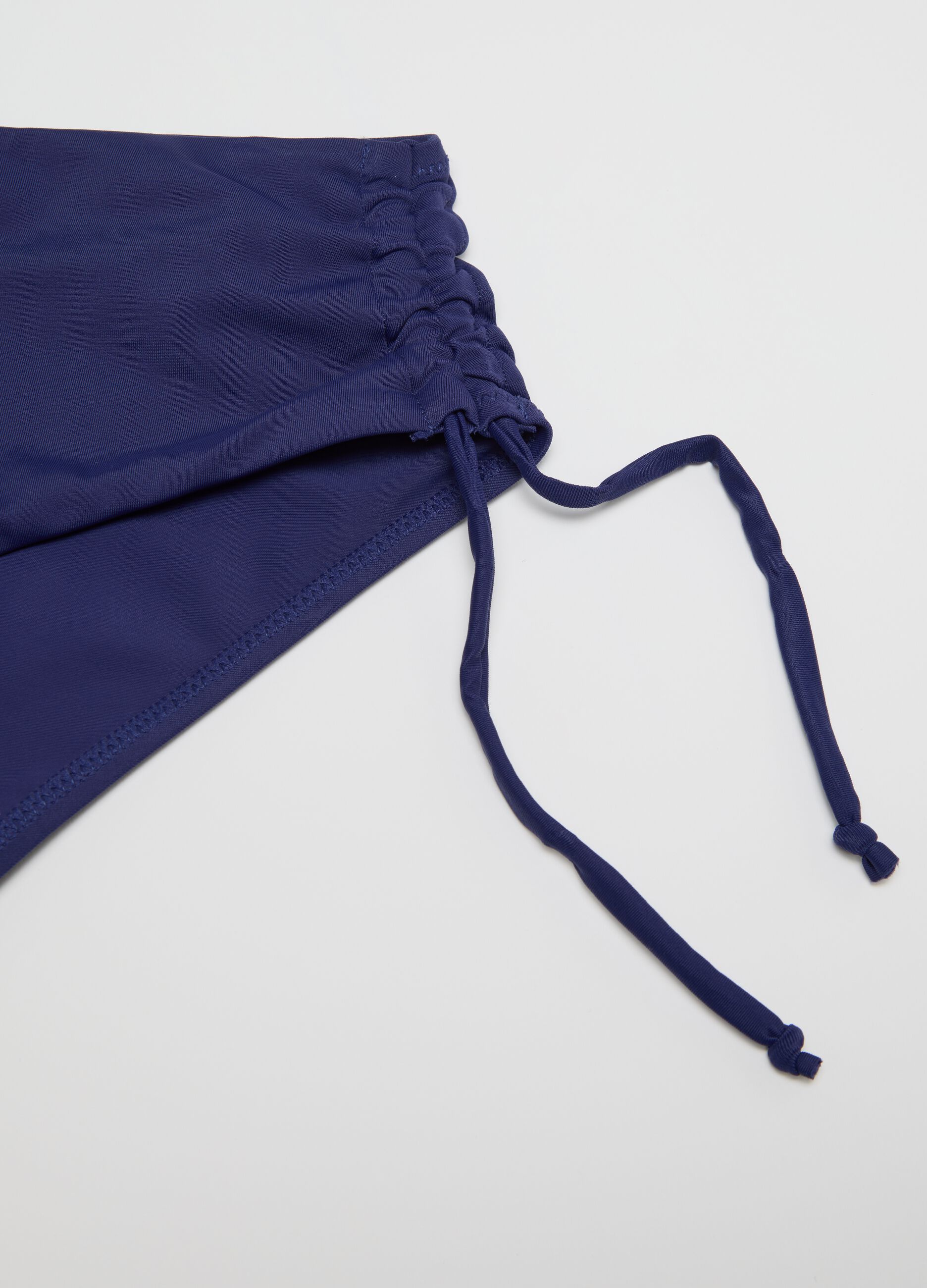 Slip bikini da donna in lycra elasticizzata blu con arricciature