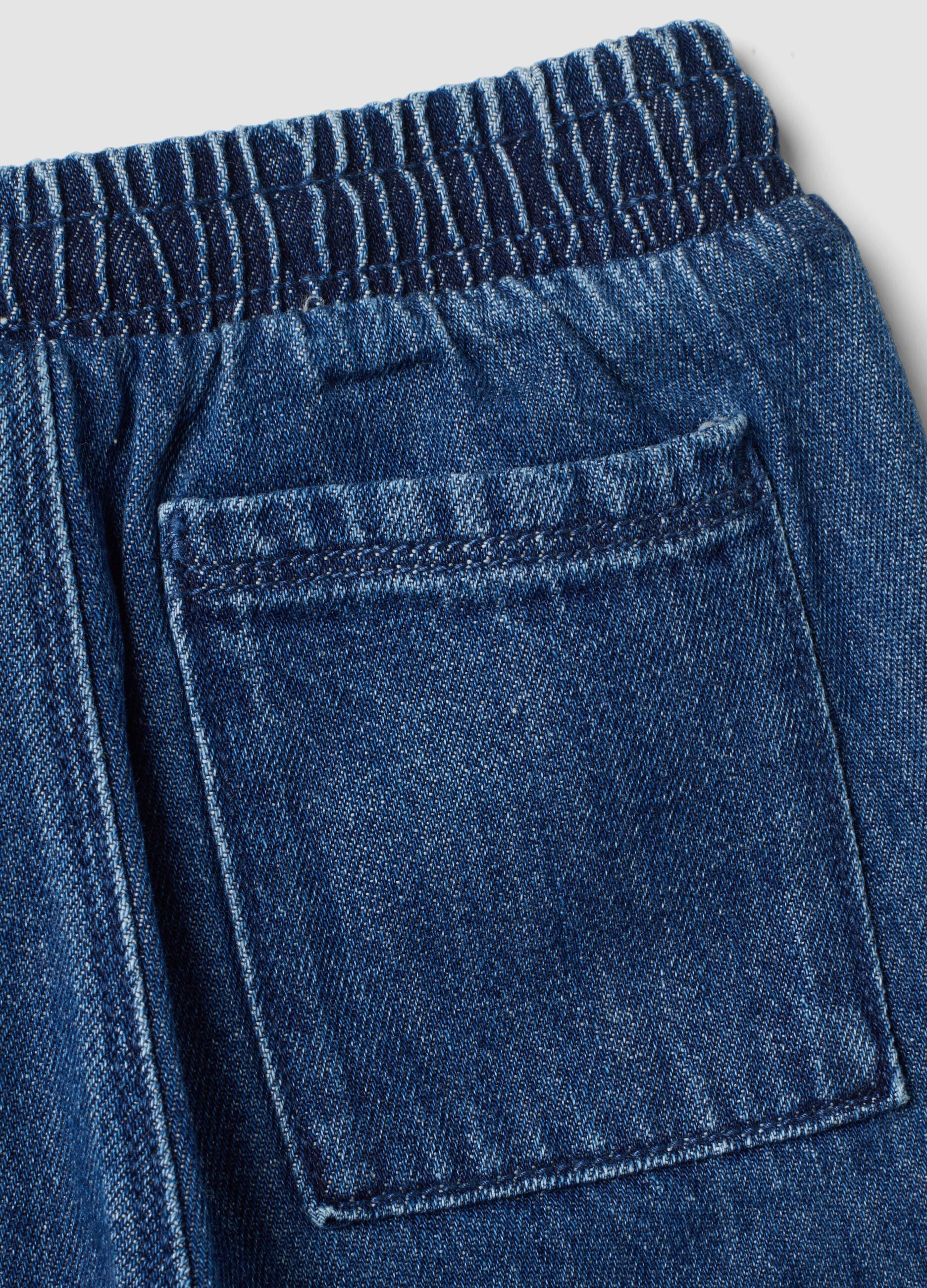 Blue denim trousers in a cotton and viscose blend with elasticated waist