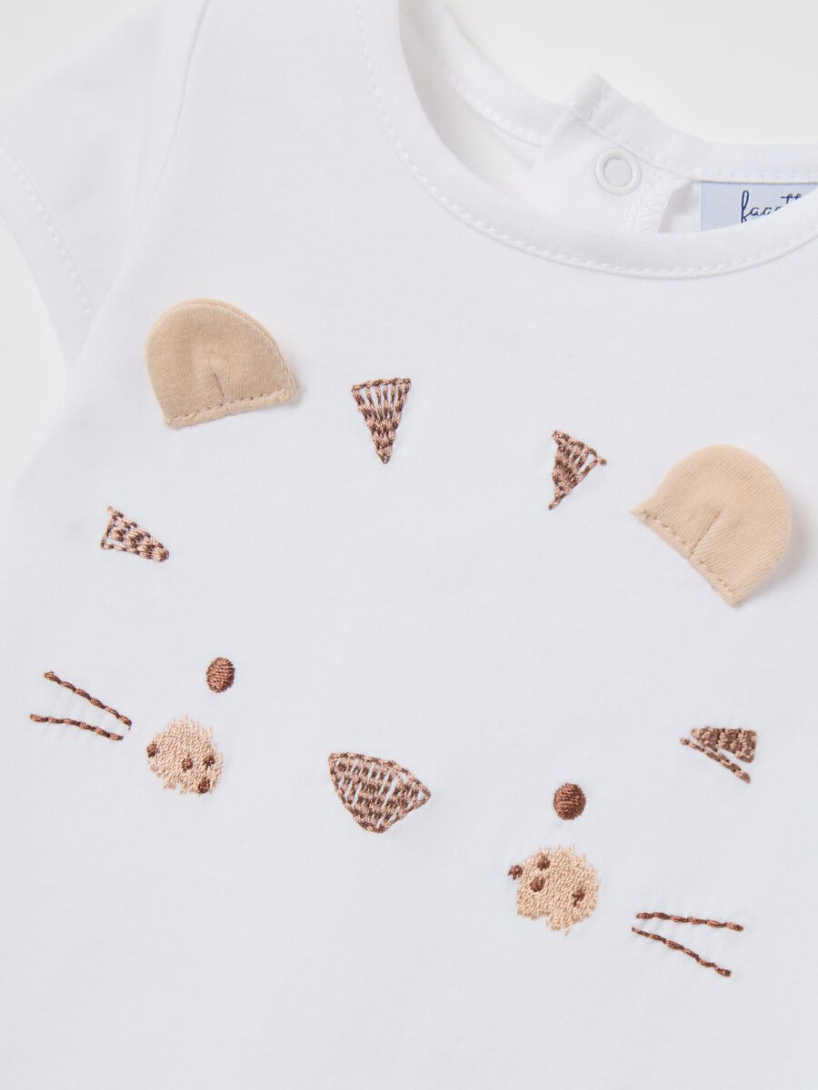 White bodysuit with kitten embroidery and applications_2