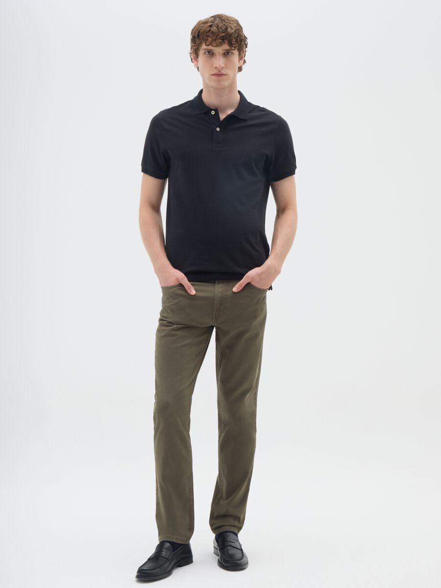 Green stretch cotton slim fit trousers_0