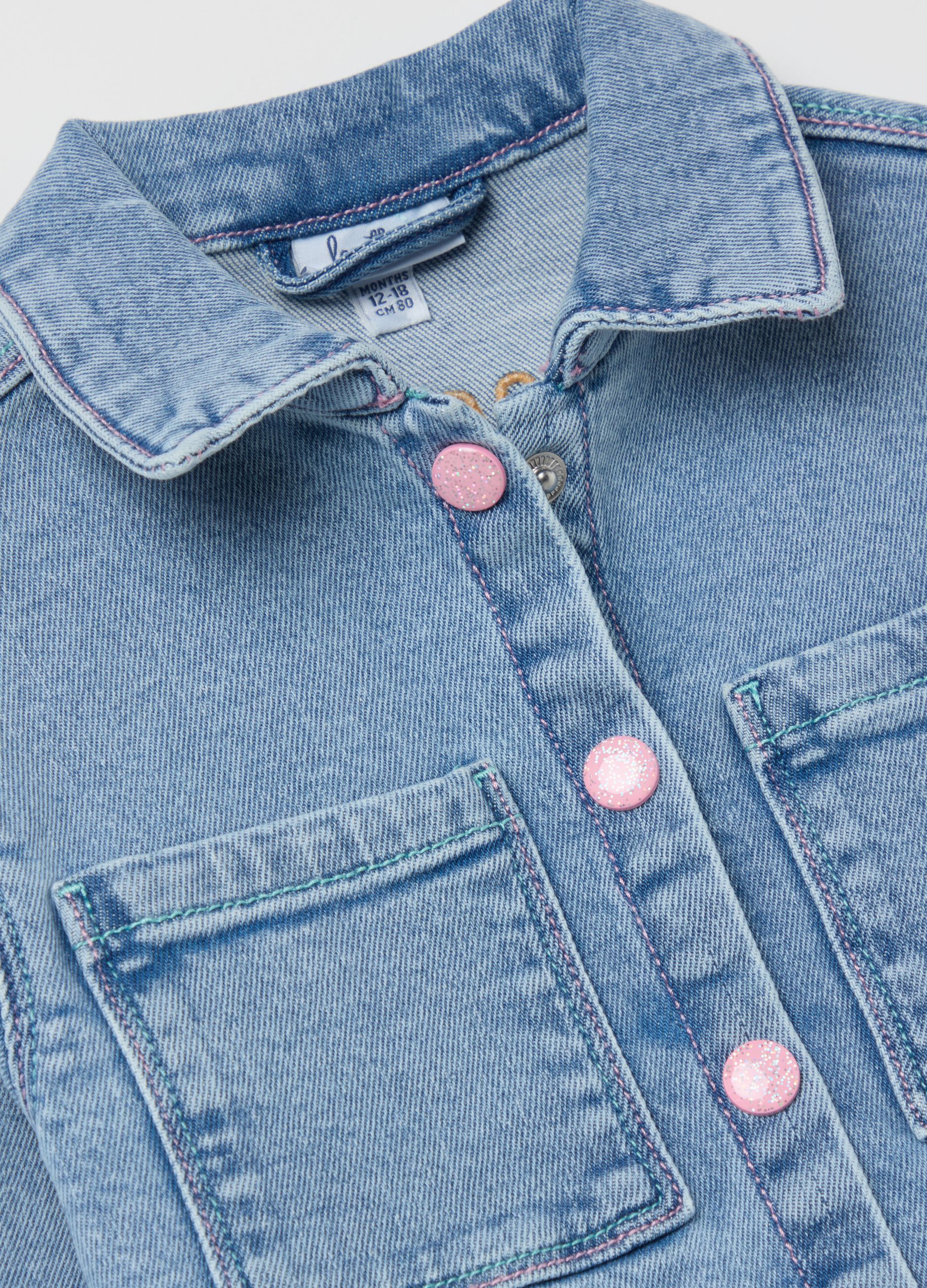 Denim jacket with pockets and hearts embroidery