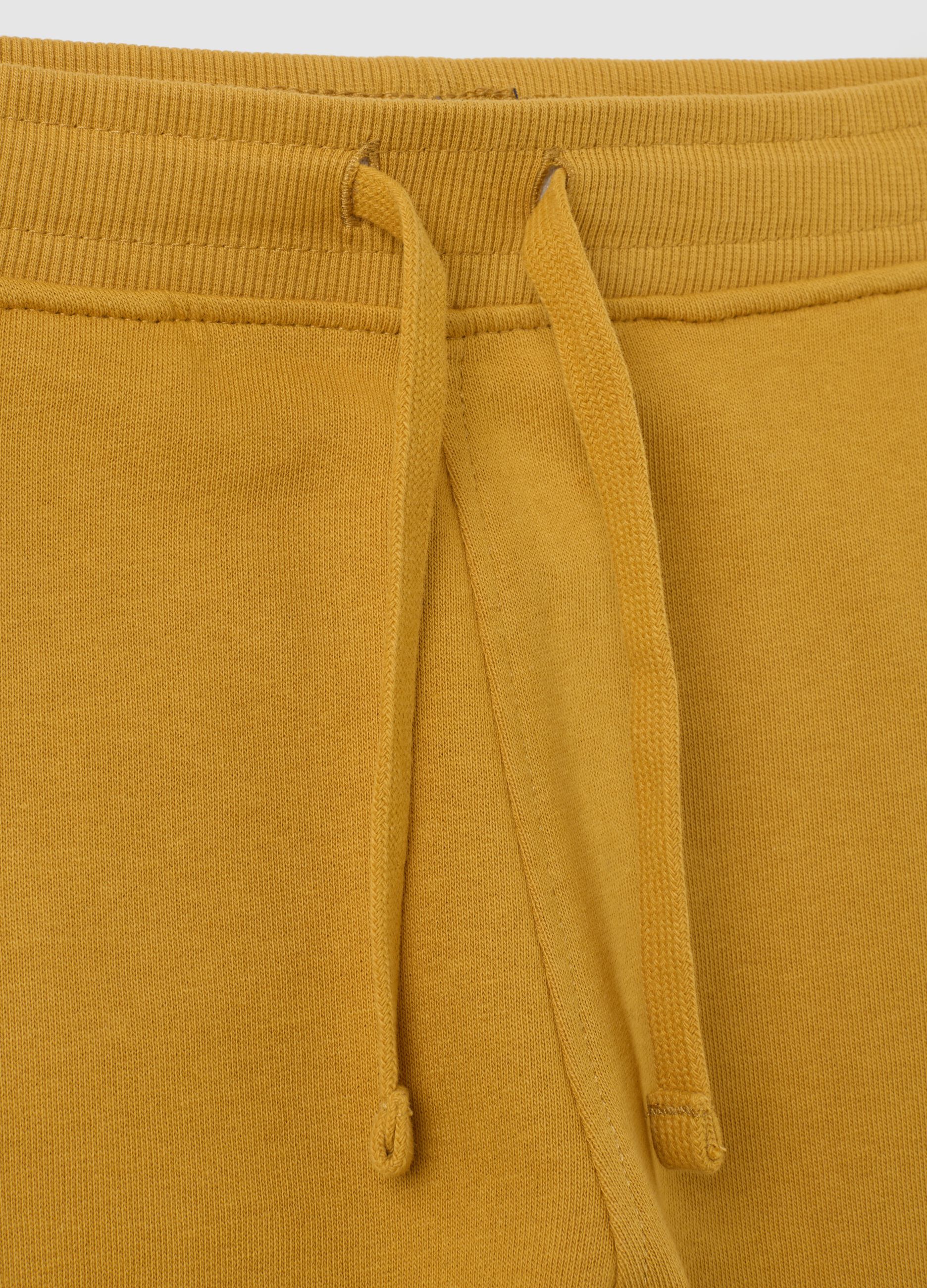 Children’s yellow regular fit cotton jogger trousers
