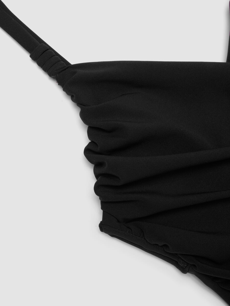 Black draped stretch swimsuit with shaping effect_1