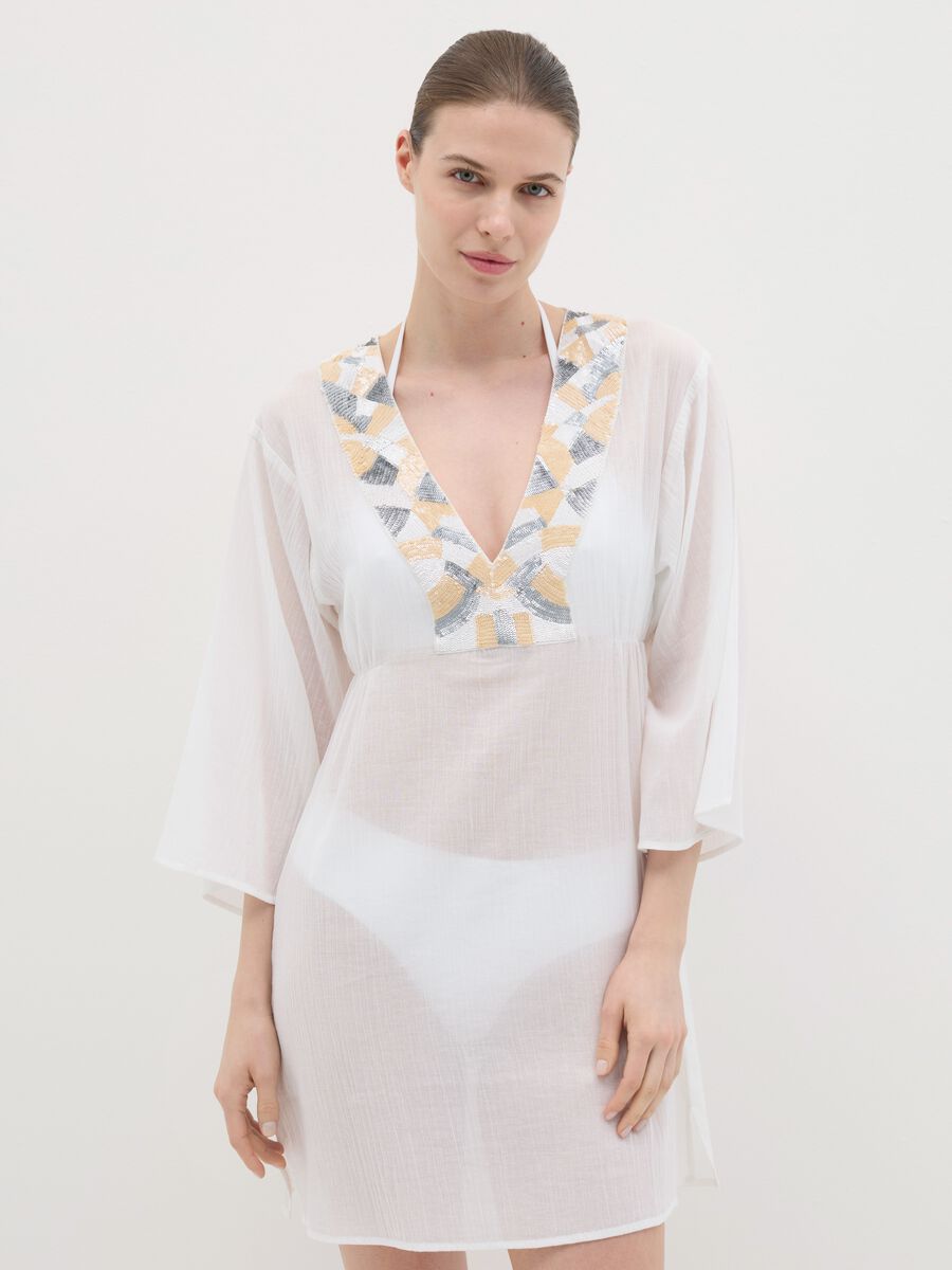 White beach cover-up with decorative edging_1