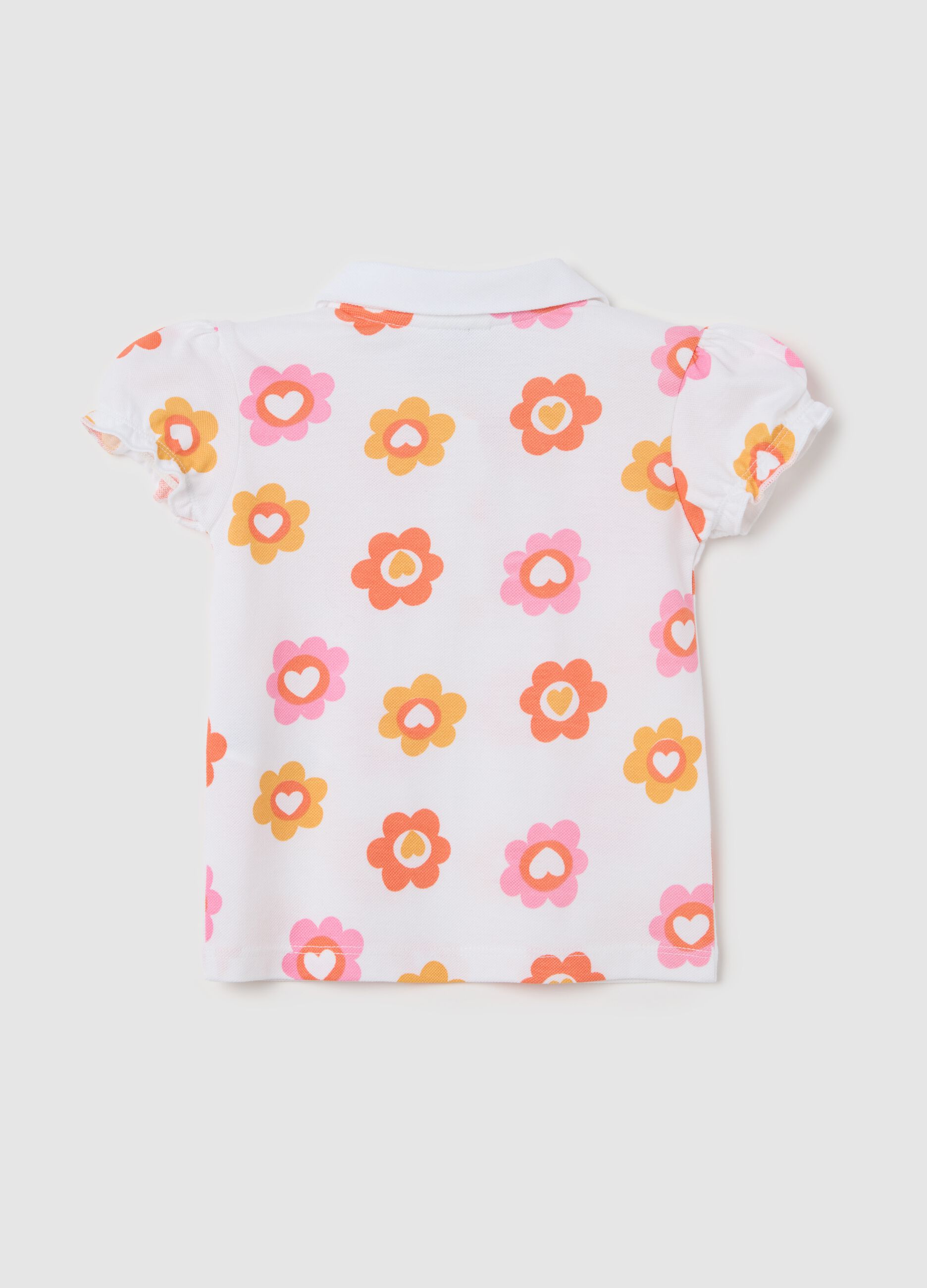 White polo shirt in organic cotton with flowers print