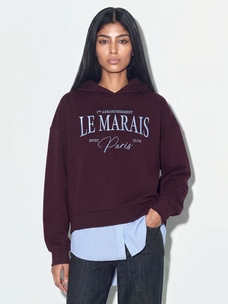 Purple cotton-blend hoodie with layered shirt-effect hem_0