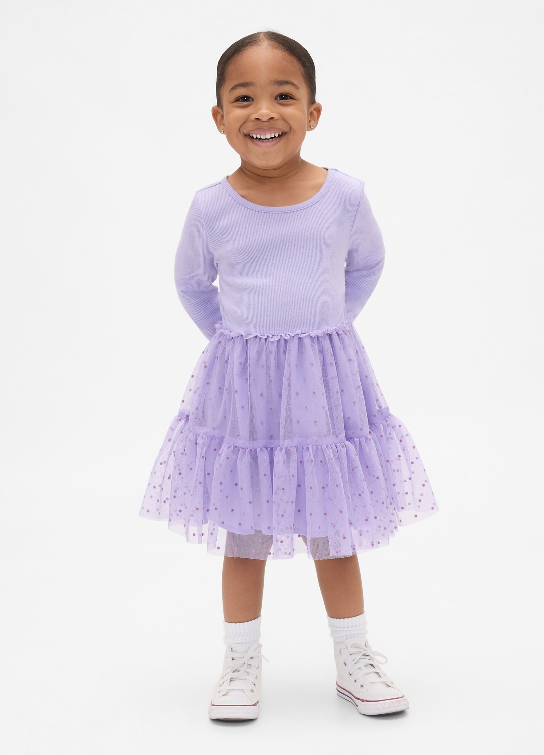 Purple dress in mixed materials with tulle