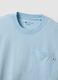 T-shirt azzurra in puro cotone con taschino regular fit_1