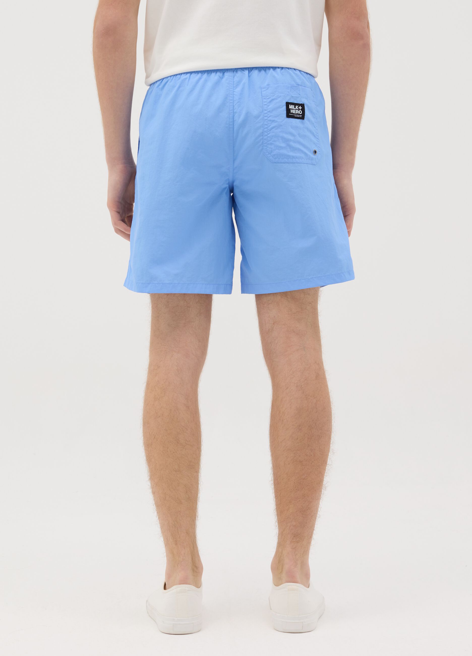 Blue swim shorts in mixed fabric