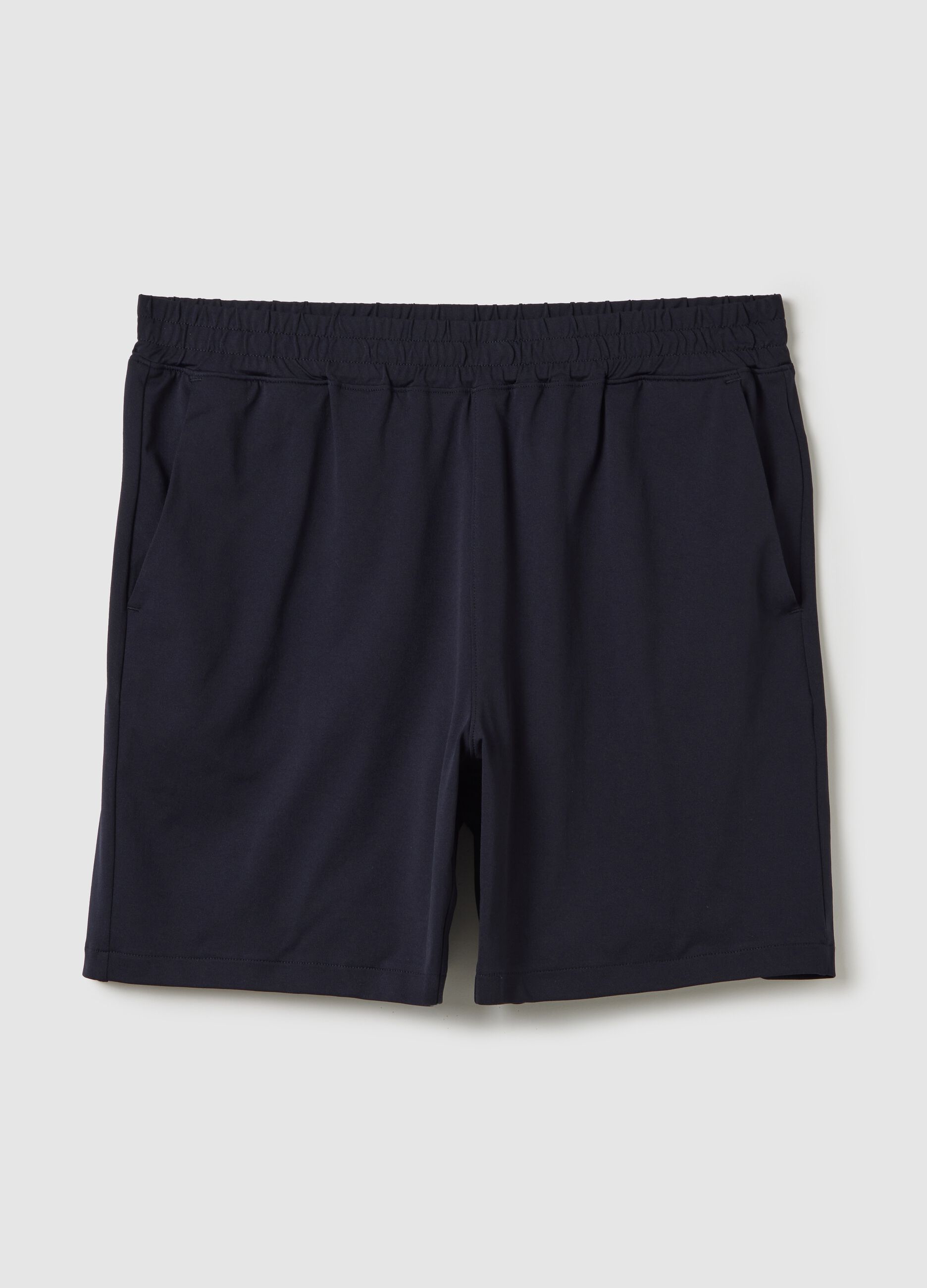 Blue Bermuda joggers in stretch fabric