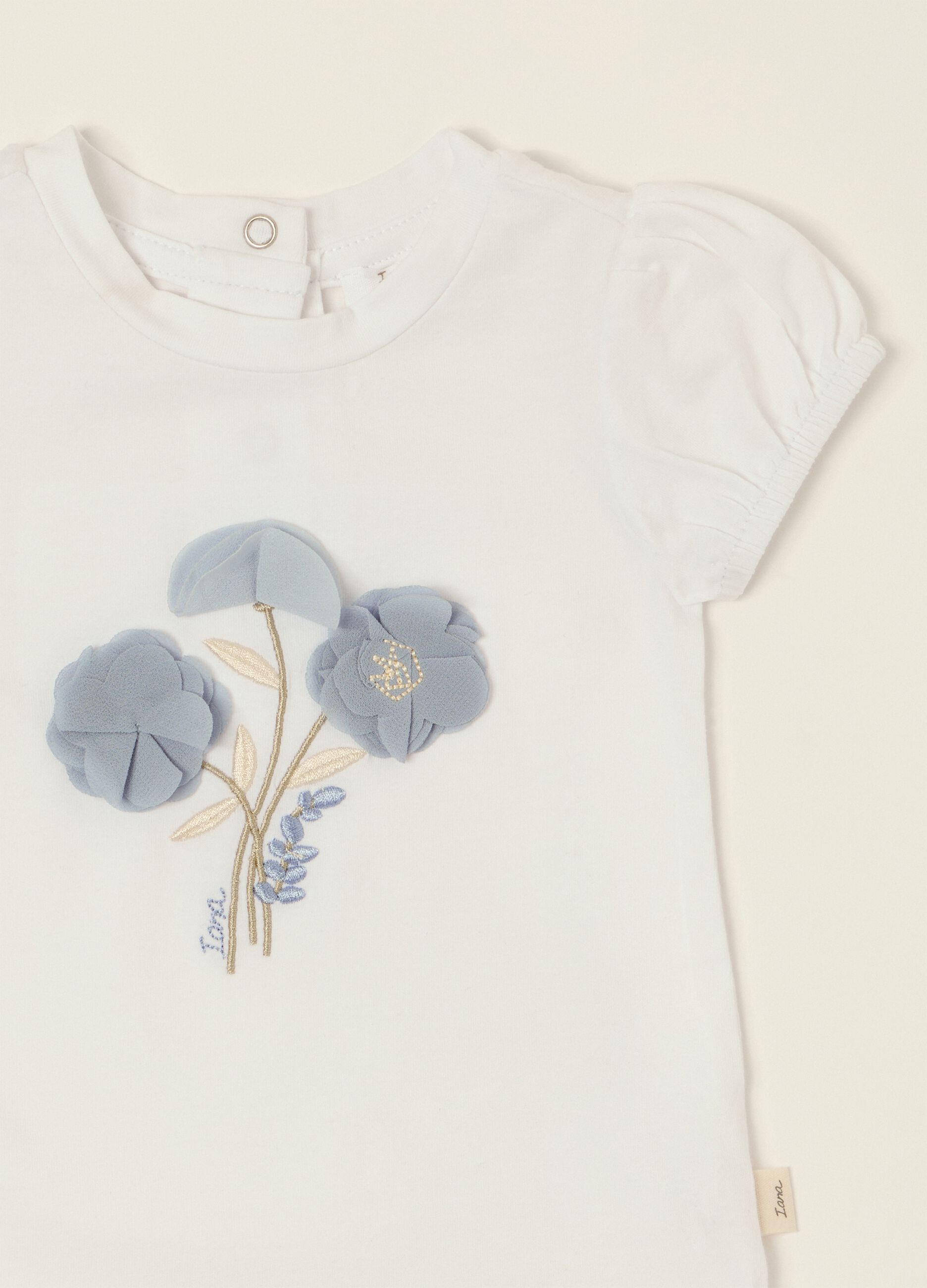 White baby girl bodysuit with floral details in stretch cotton