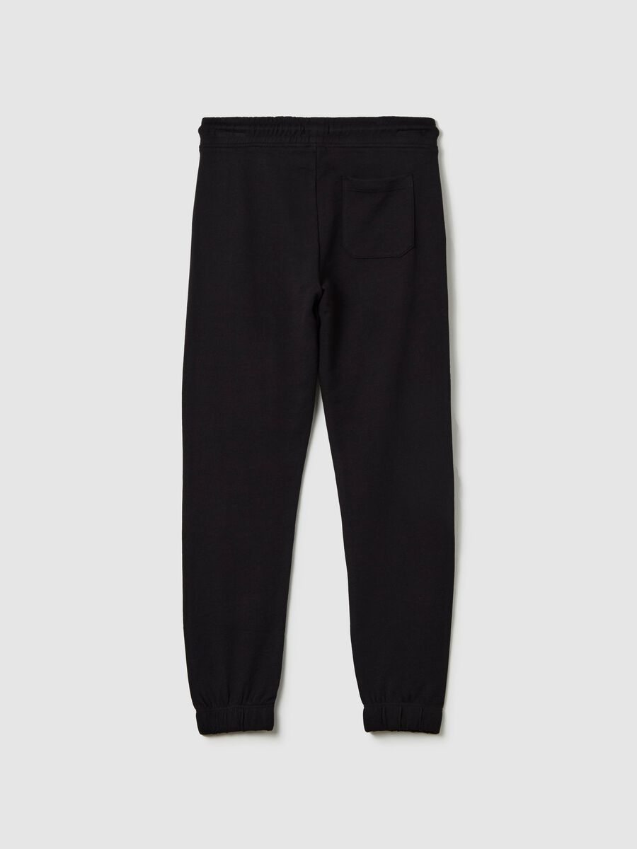 Joggers with drawstring and "Step Aside" print_4