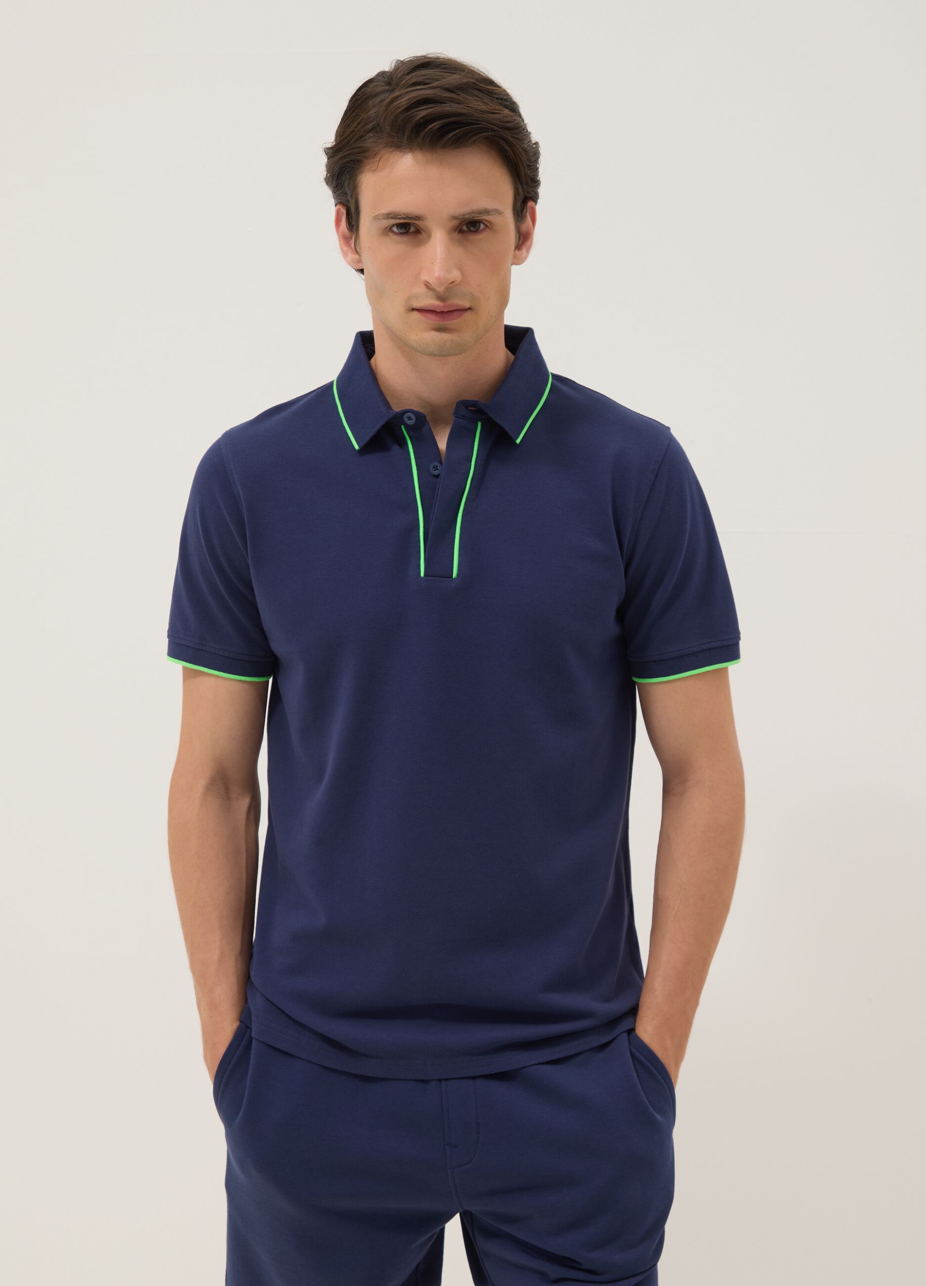 Polo blu a maniche corte in cotone elasticizzato