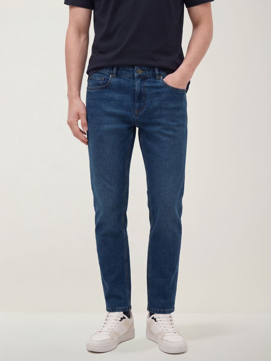 Jeans blu denim in misto cotone e viscosa slim fit_1