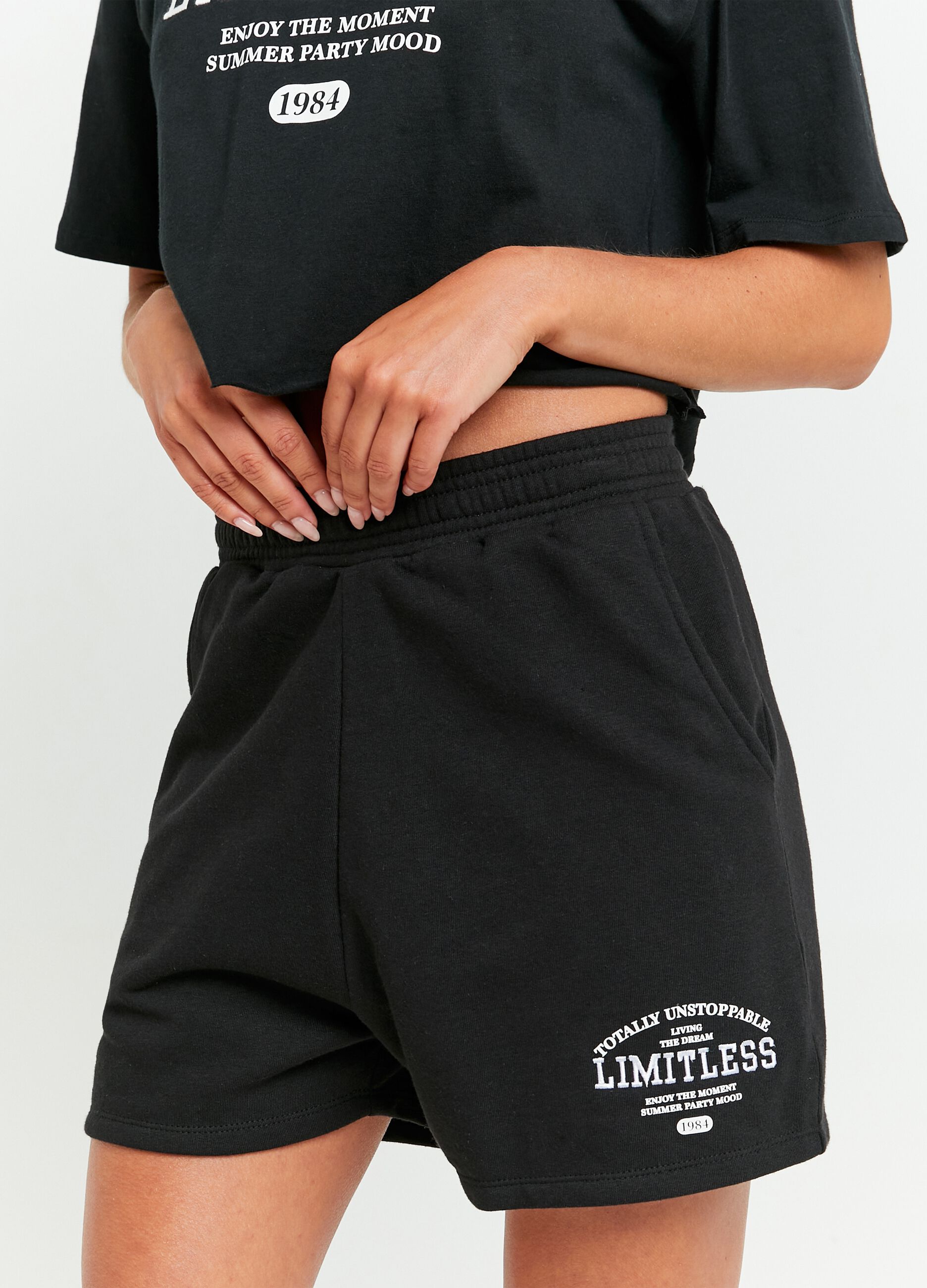 Fleece shorts with lettering print