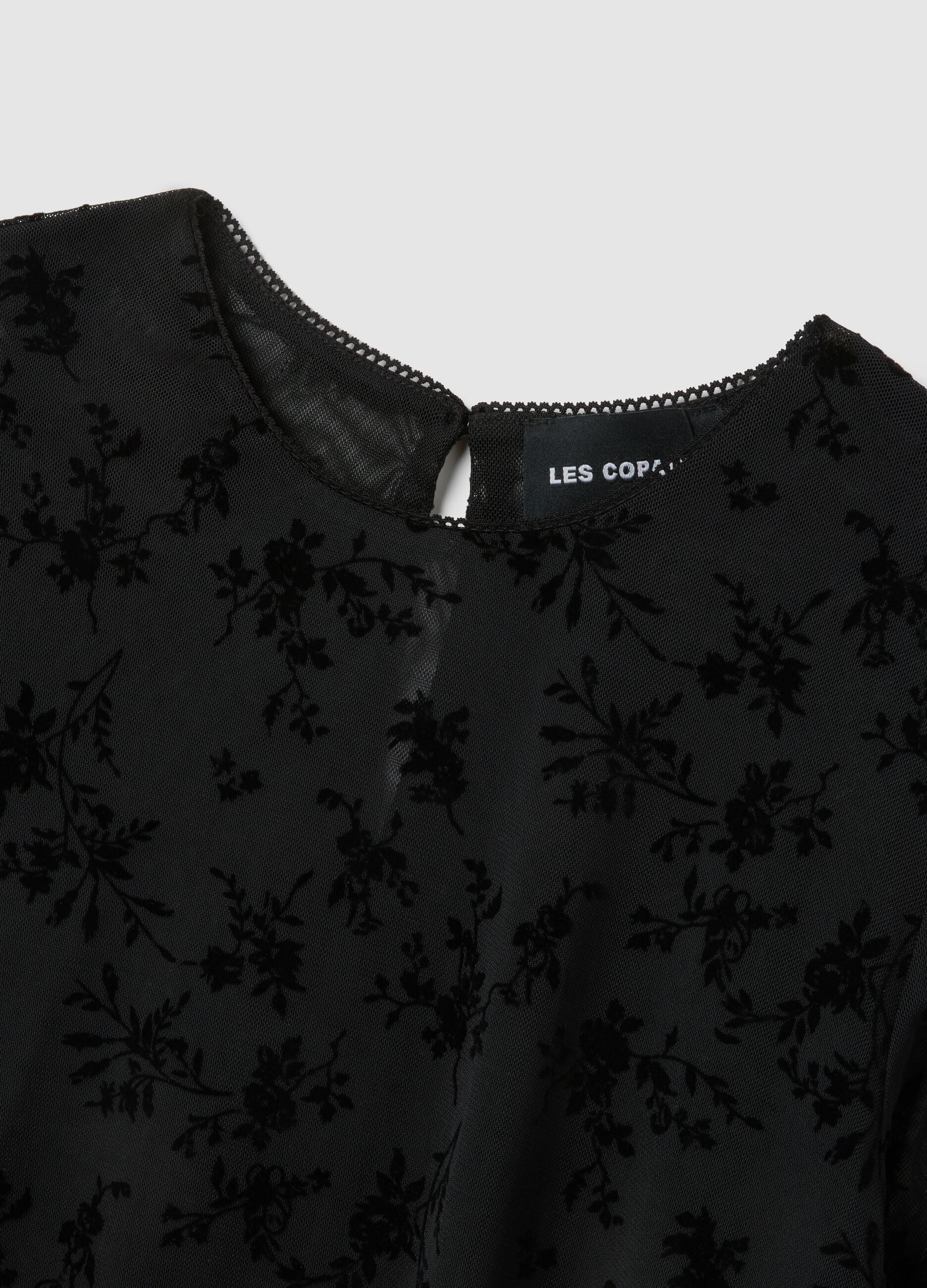 Transparent black t-shirt with floral patterns