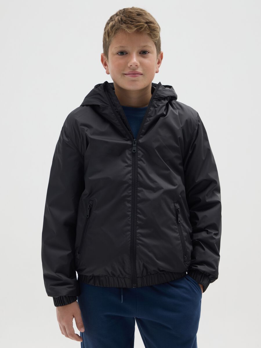 Giubbotto da ragazzo in nero water repellent_0
