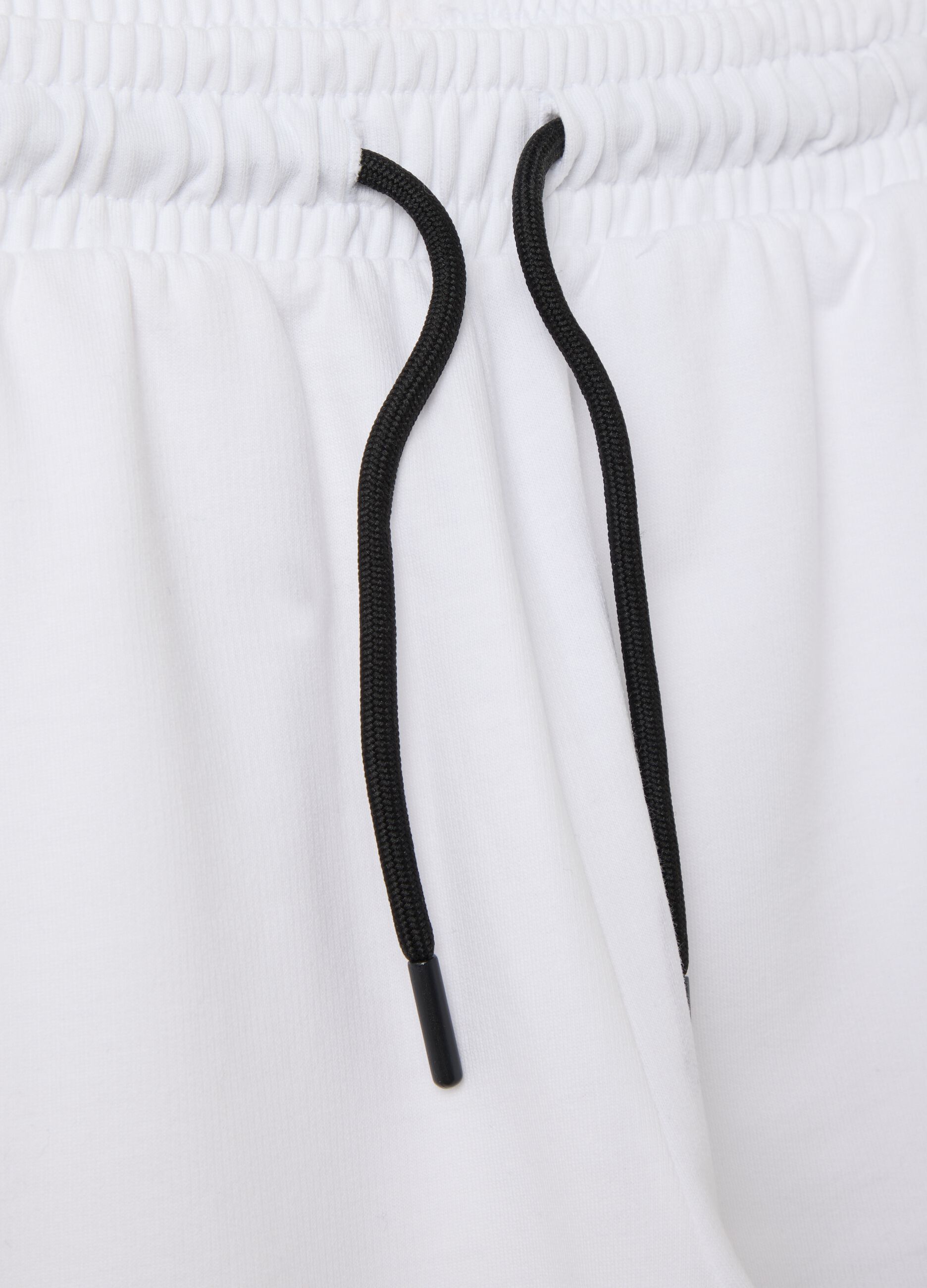 White shorts with Maui logo