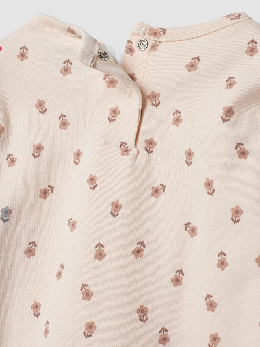 Pigiama rosa in puro cotone organico con stampa floreale per neonata e bimba_2