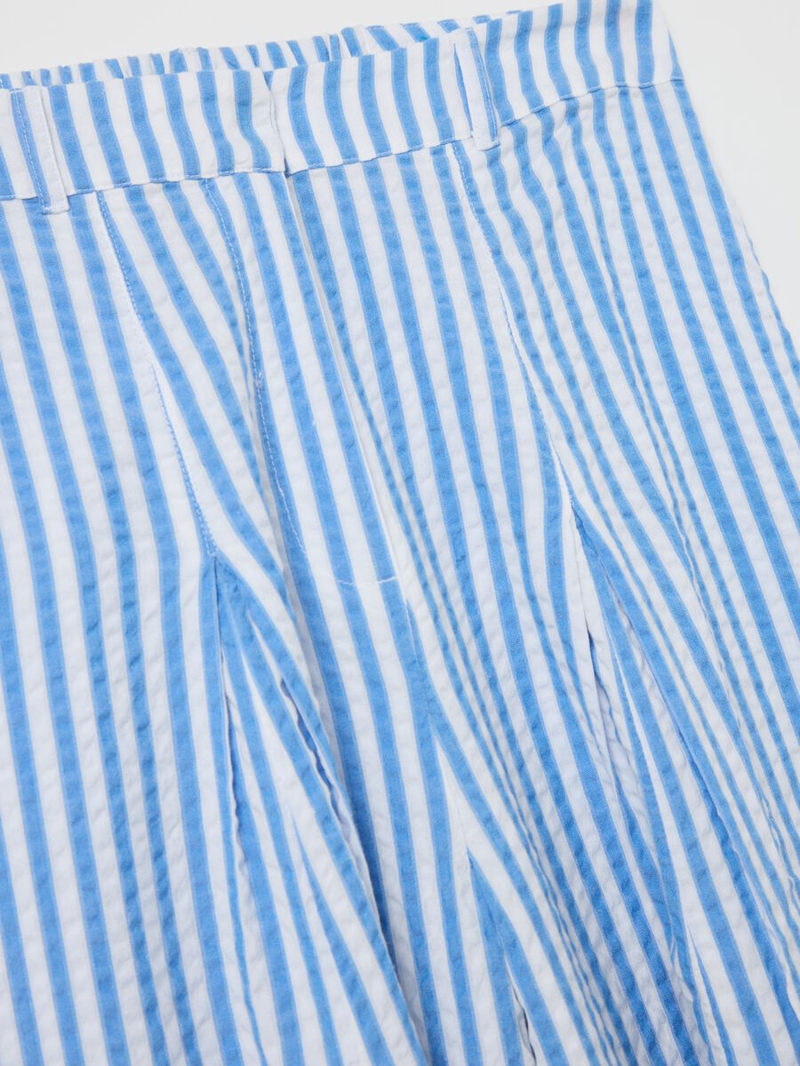 Blue flare-fit trousers in striped seersucker_5