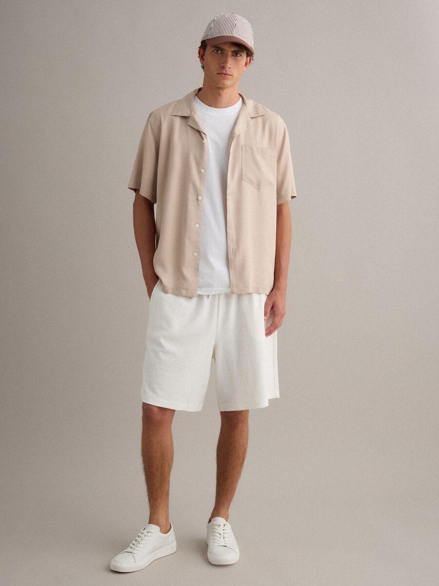 Shorts jogger bianchi in misto cotone con coulisse relaxed fit_0